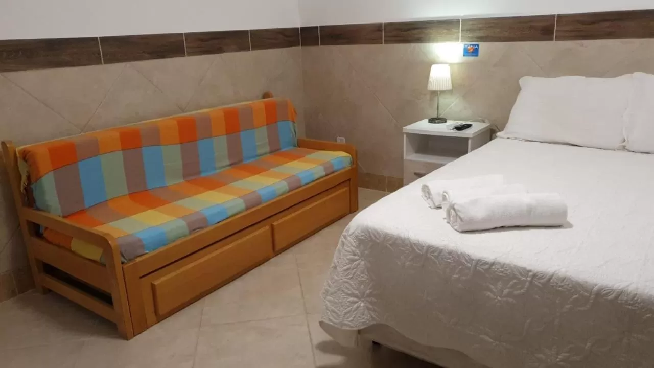 Bed in Pousada Itapuã RS