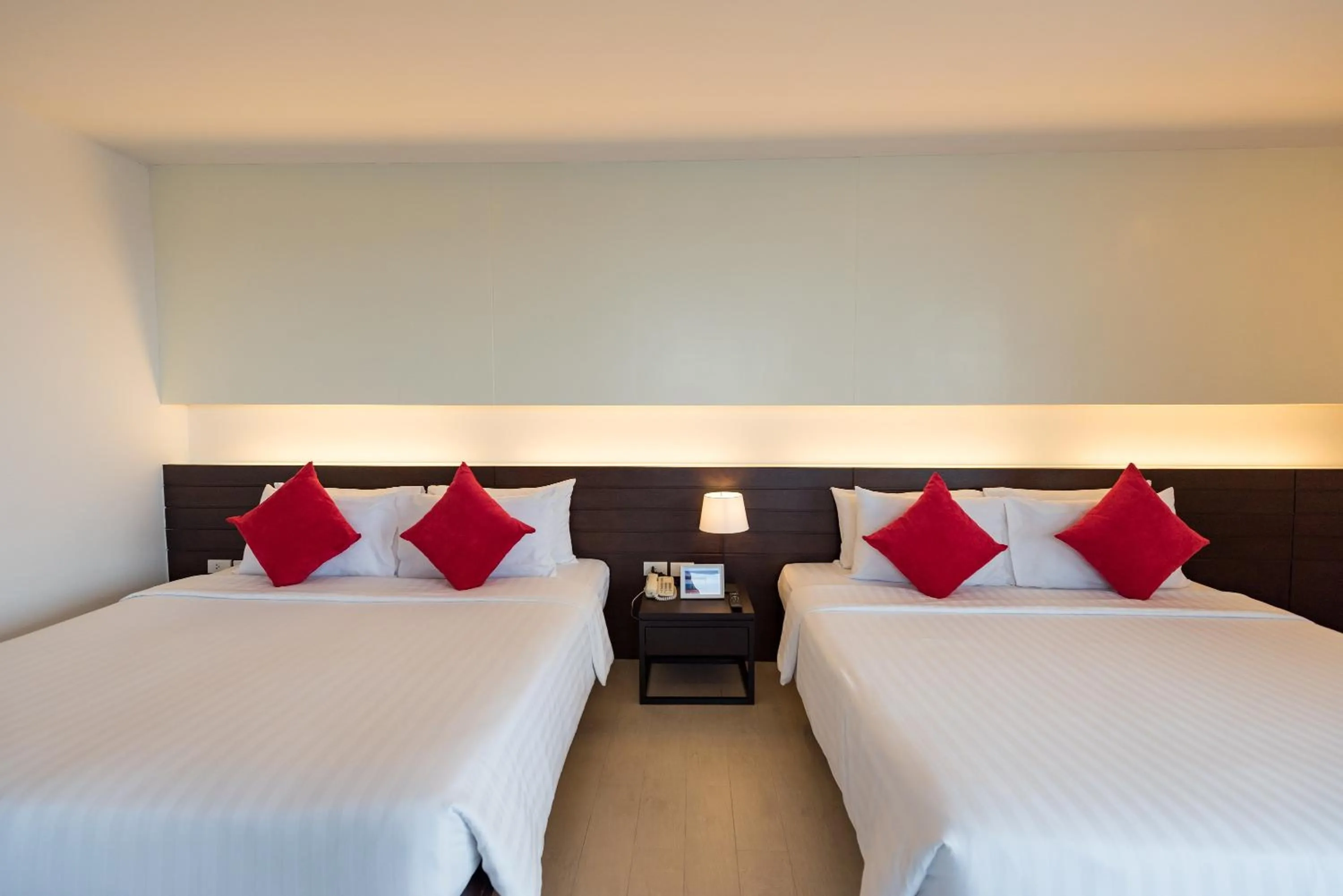 Bed in Hotel J Pattaya