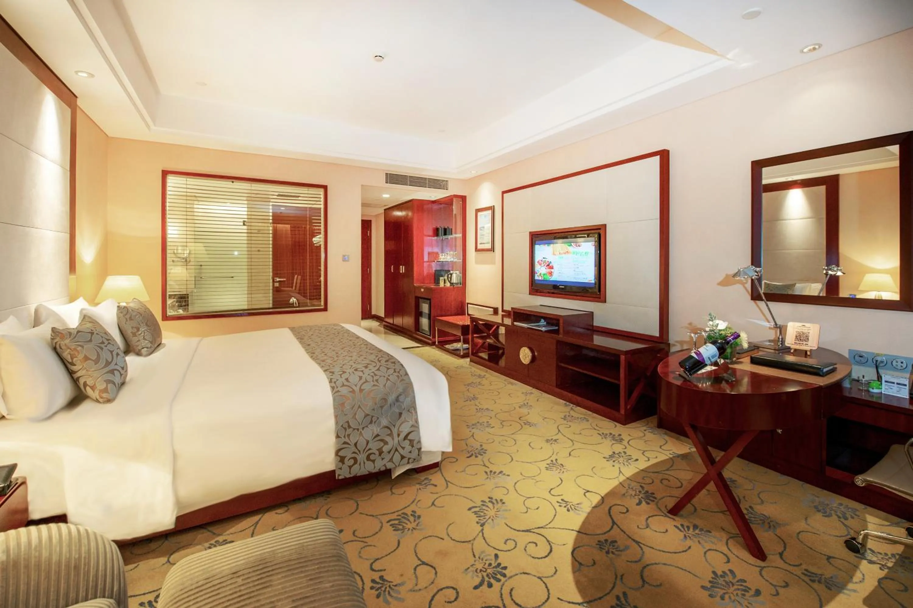 Photo of the whole room, Bed in Howard Johnson Tropical Garden Plaza Kunming Chenggong