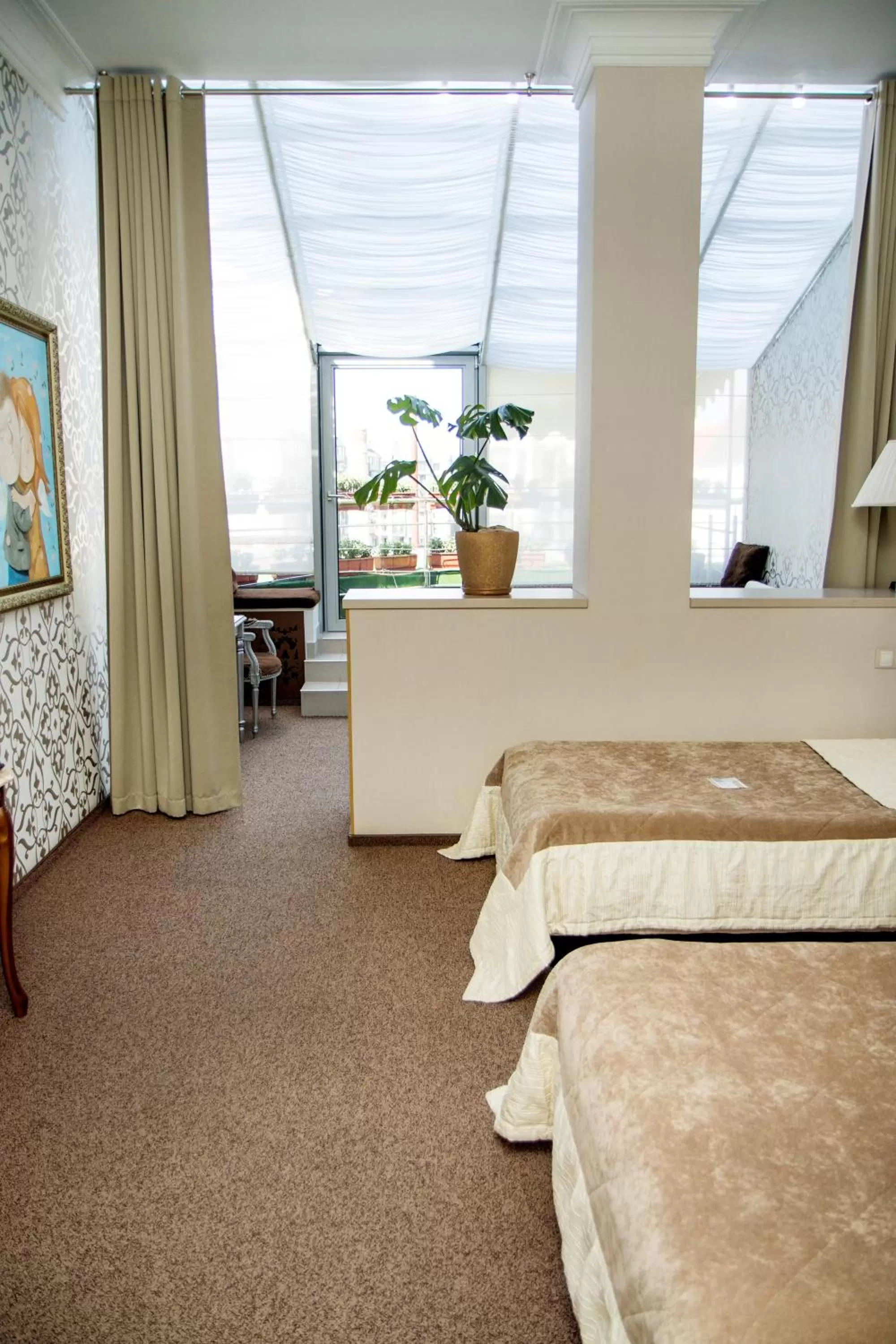 Photo of the whole room, Bed in Boutique Spa Casino Hotel Lybid Plaza