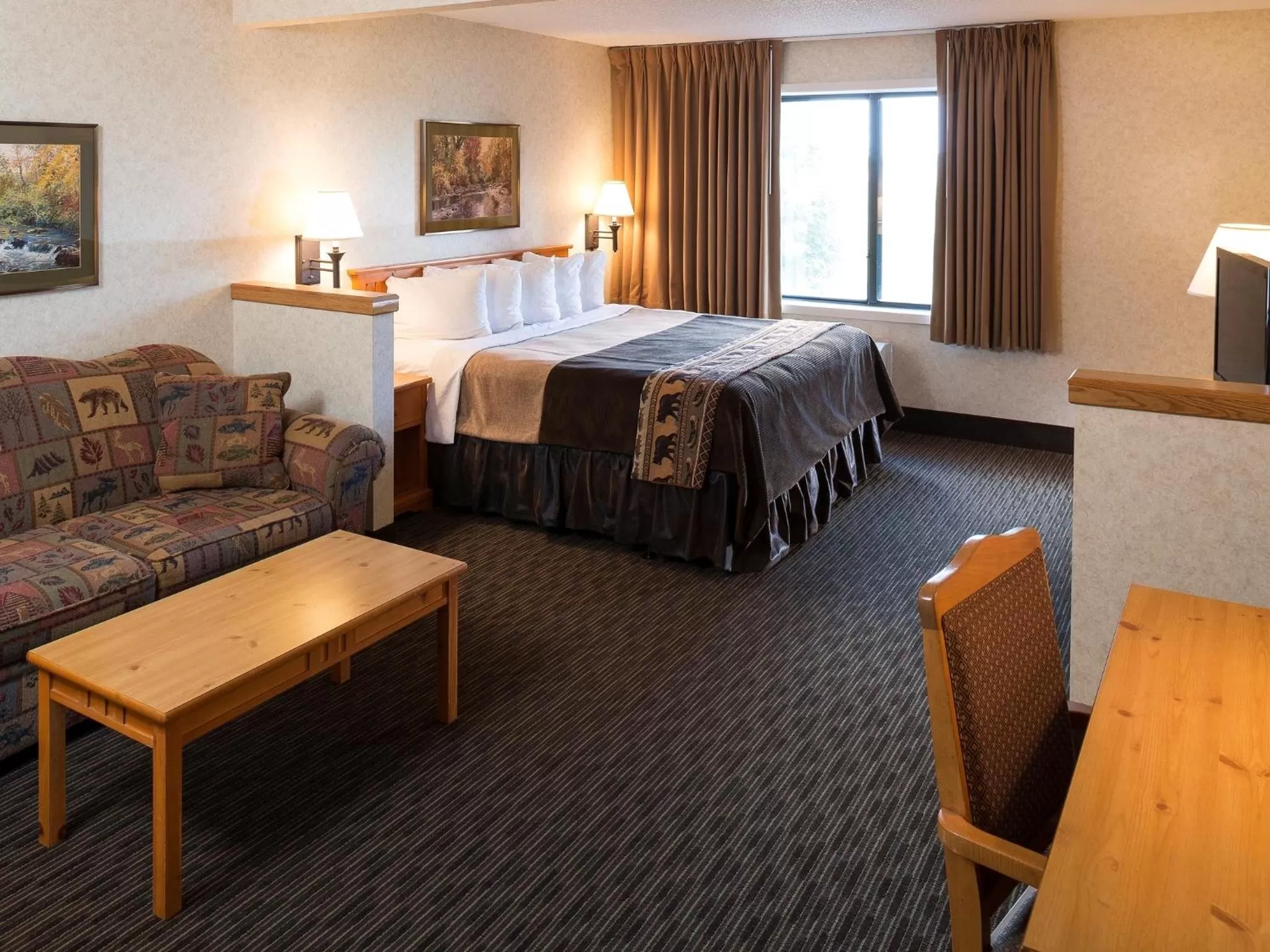 Photo of the whole room, Bed in Kelly Inn and Suites Mitchell