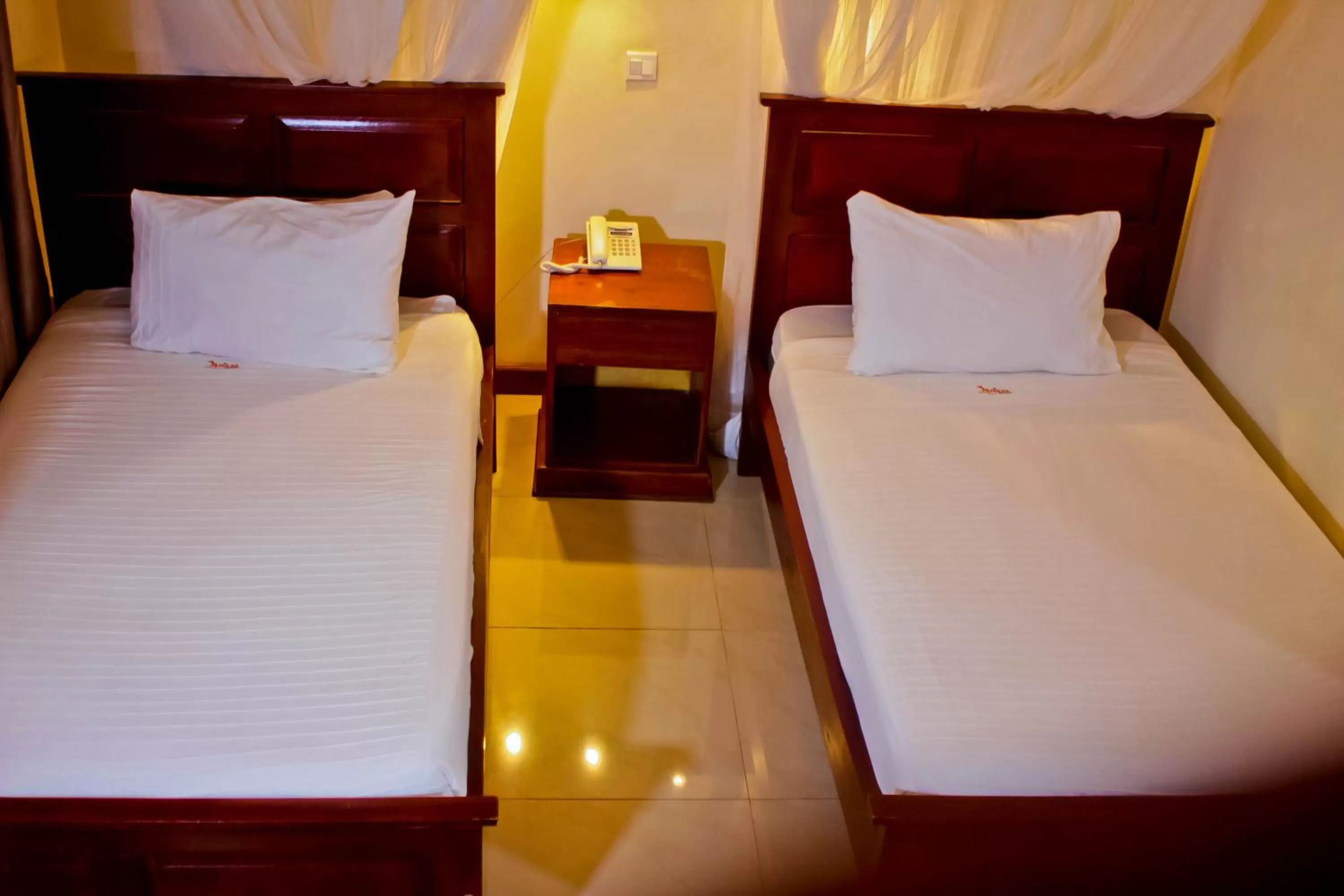 Bed in Al-Nisaa Hotel and Spa