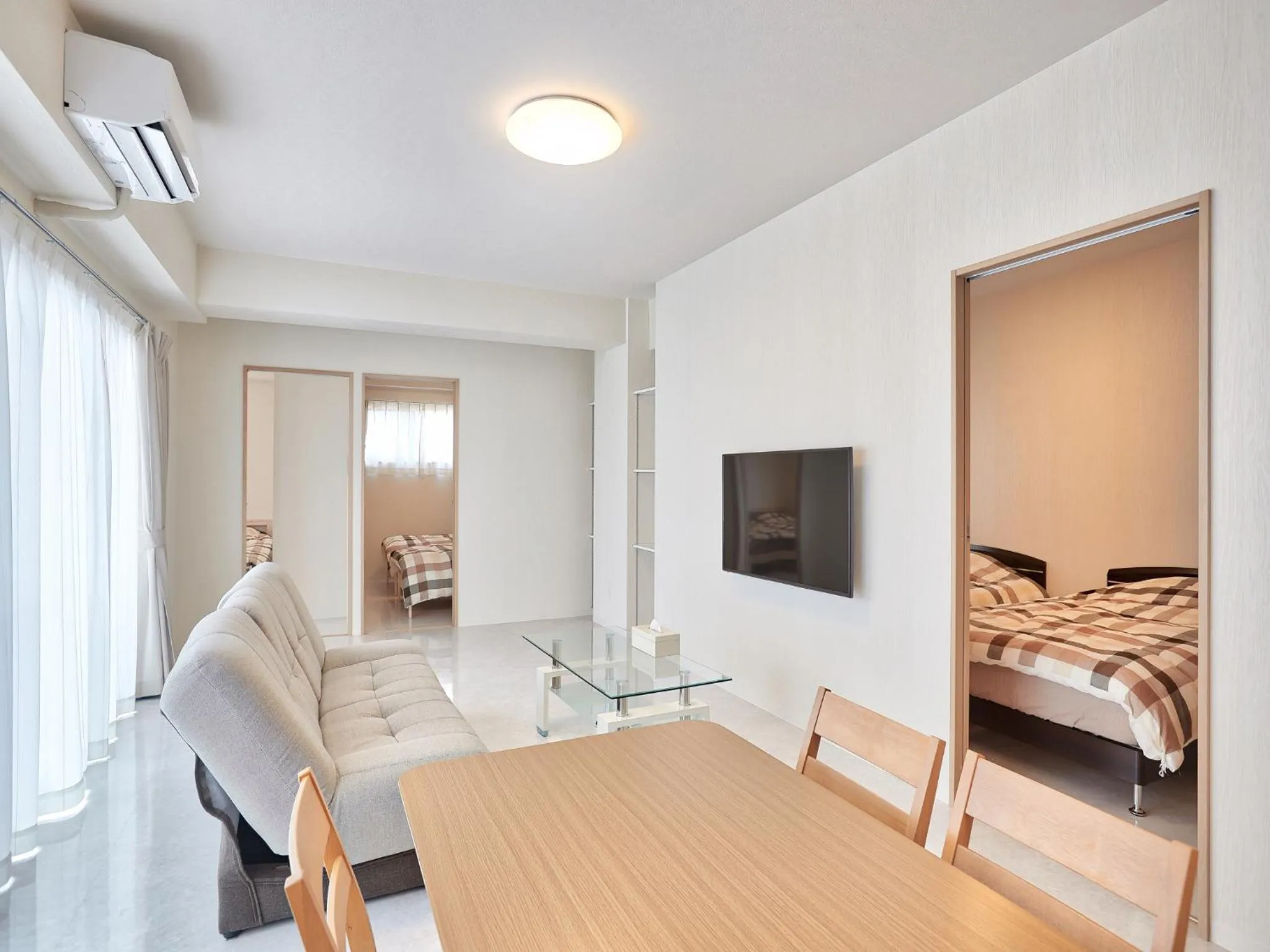 Living room, Bed in Mango Resort Okinawa Chatan