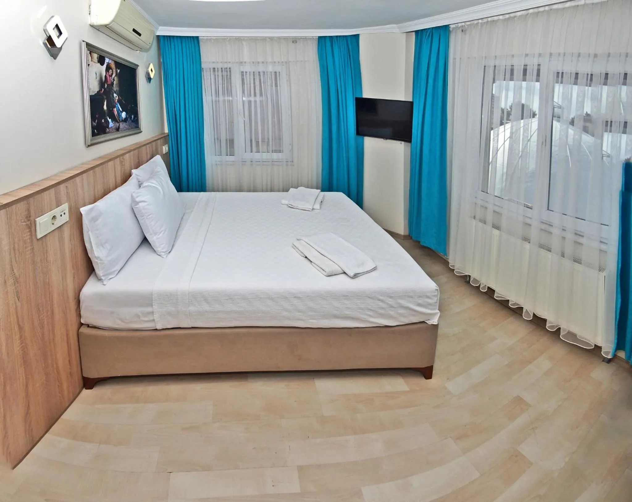 Bed in Le Safran Palace Hotel