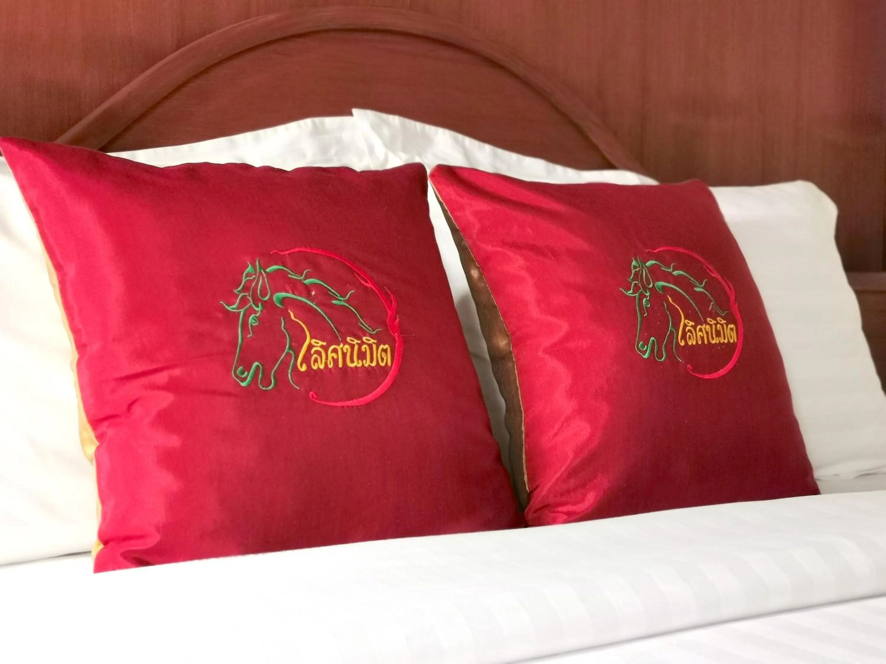 Bed in Lertnimit Boutique Hotel