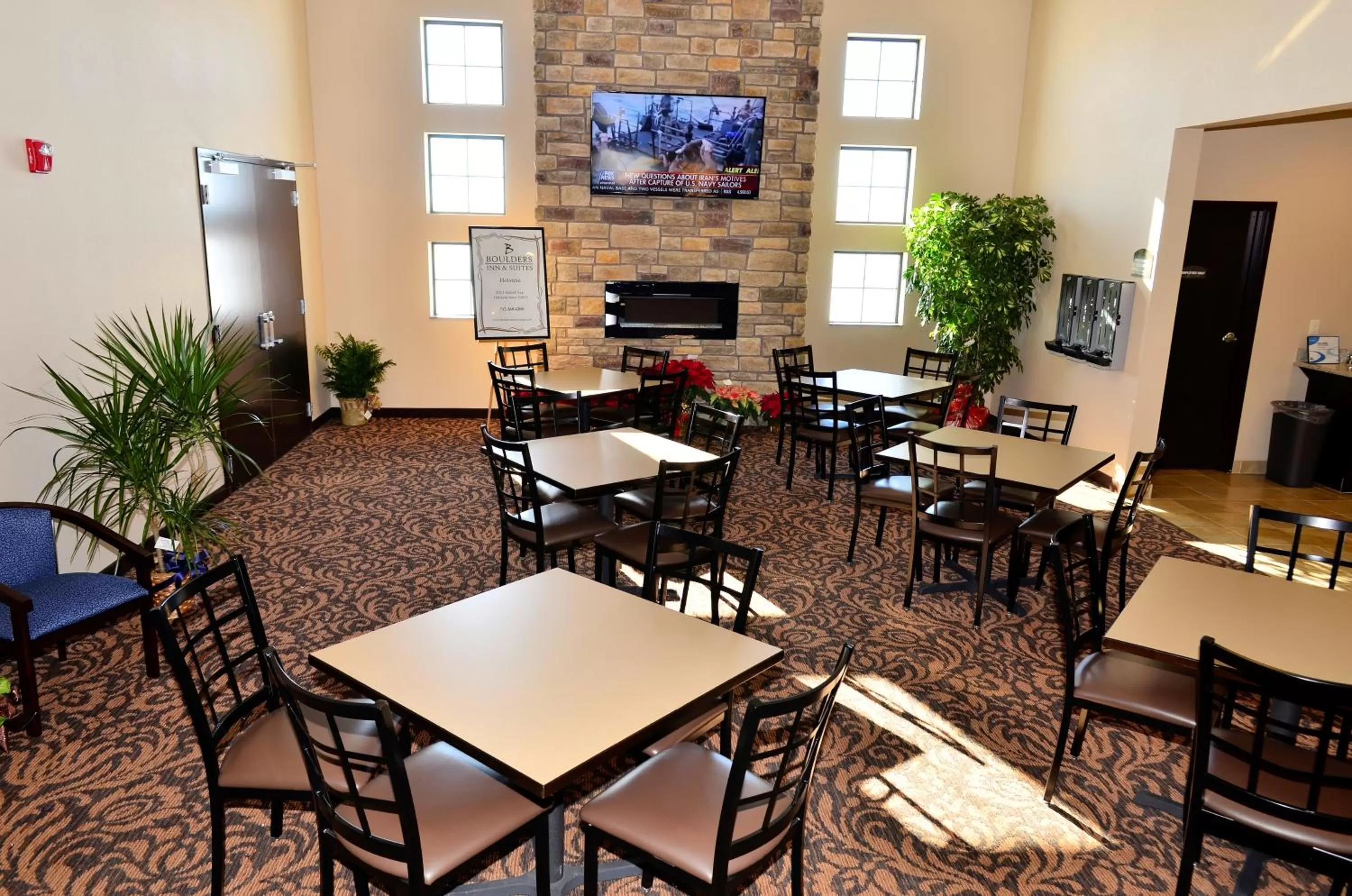 Communal lounge/ TV room in Cobblestone Inn & Suites - Holstein