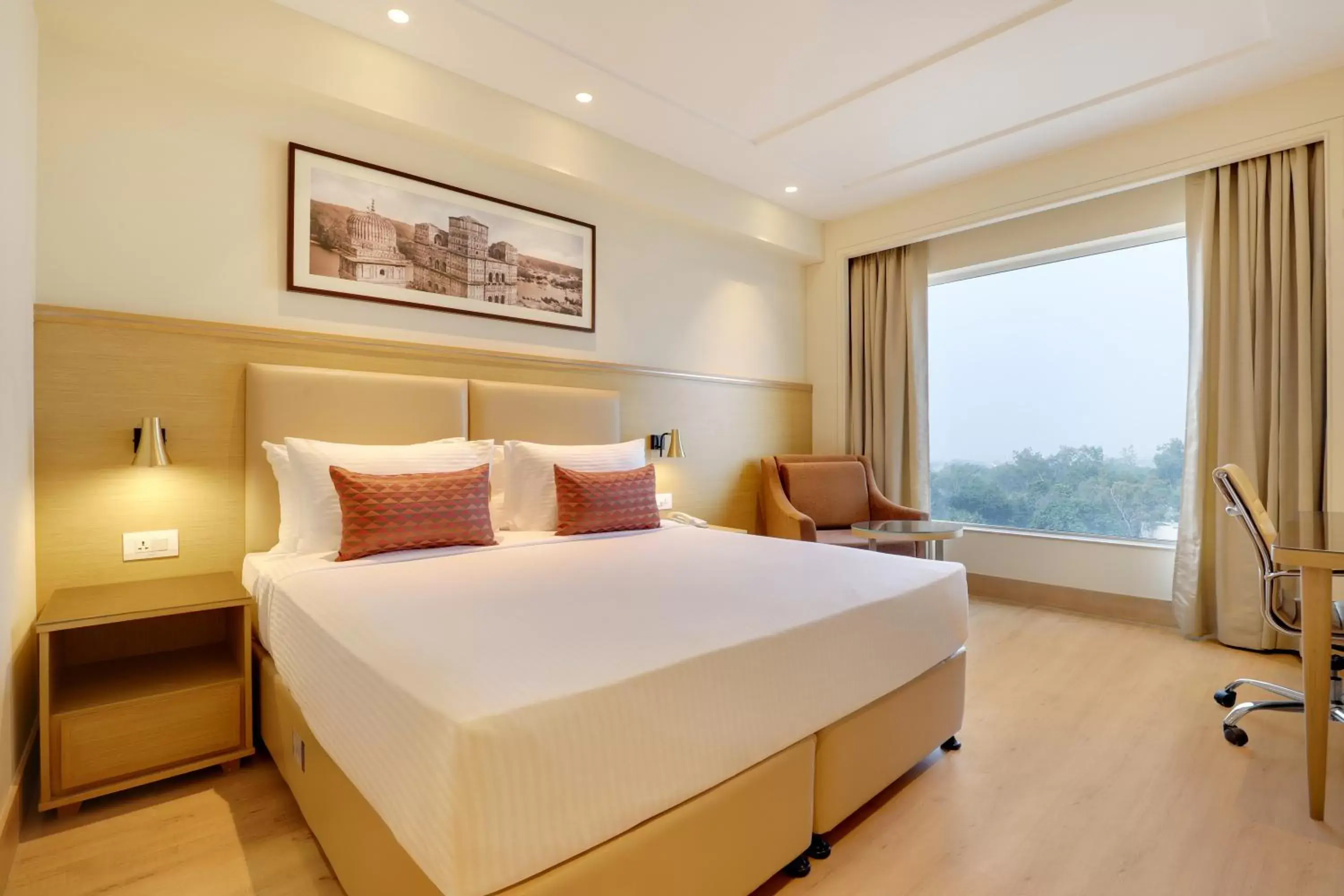 Deluxe King Room - single occupancy in Lemon Tree Hotel, Jhansi Deluxe King Room - single occupancy in Lemon Tree Hotel, Jhansi