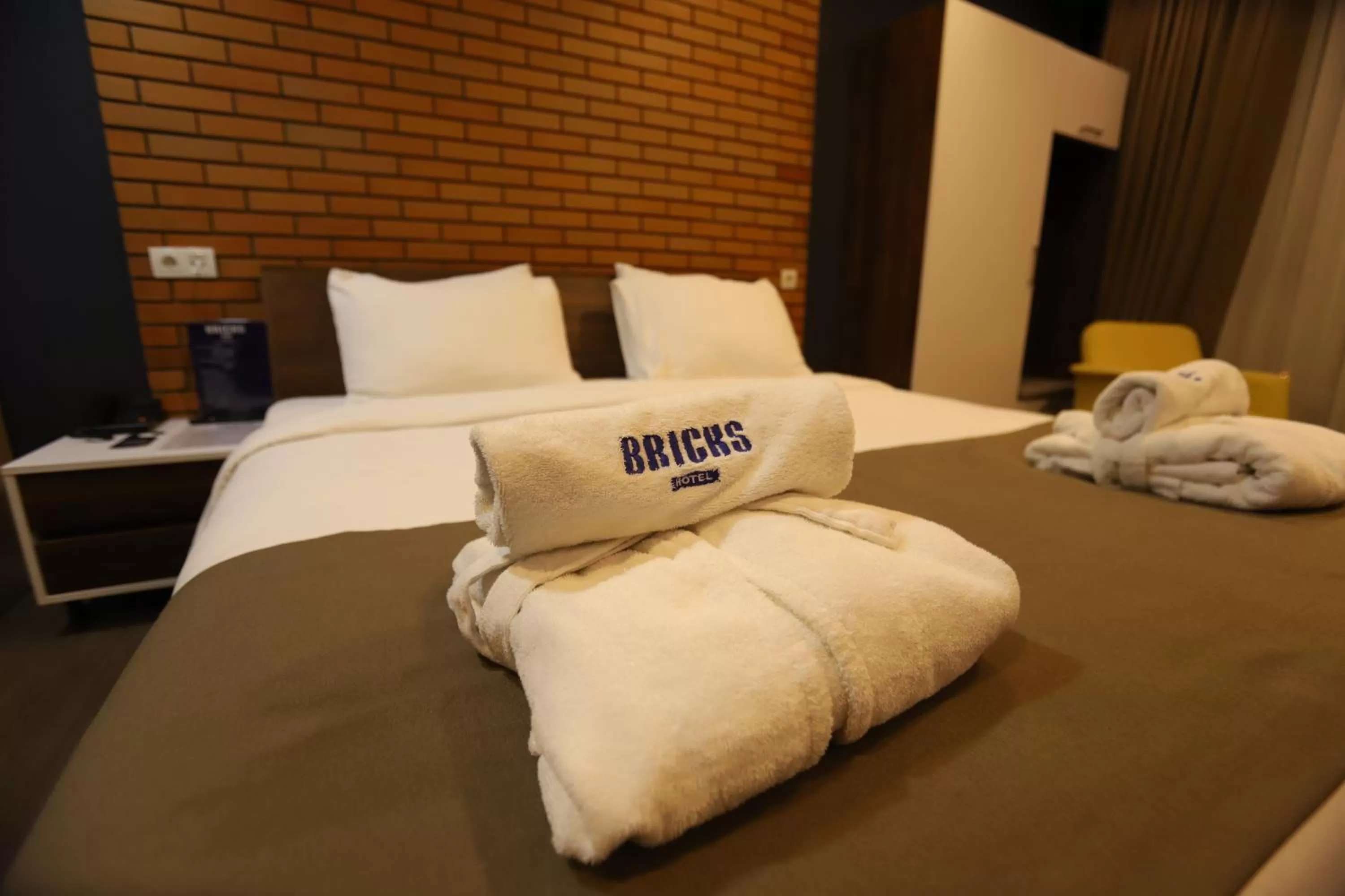 towels, Bed in Bricks Hotel Tbilisi