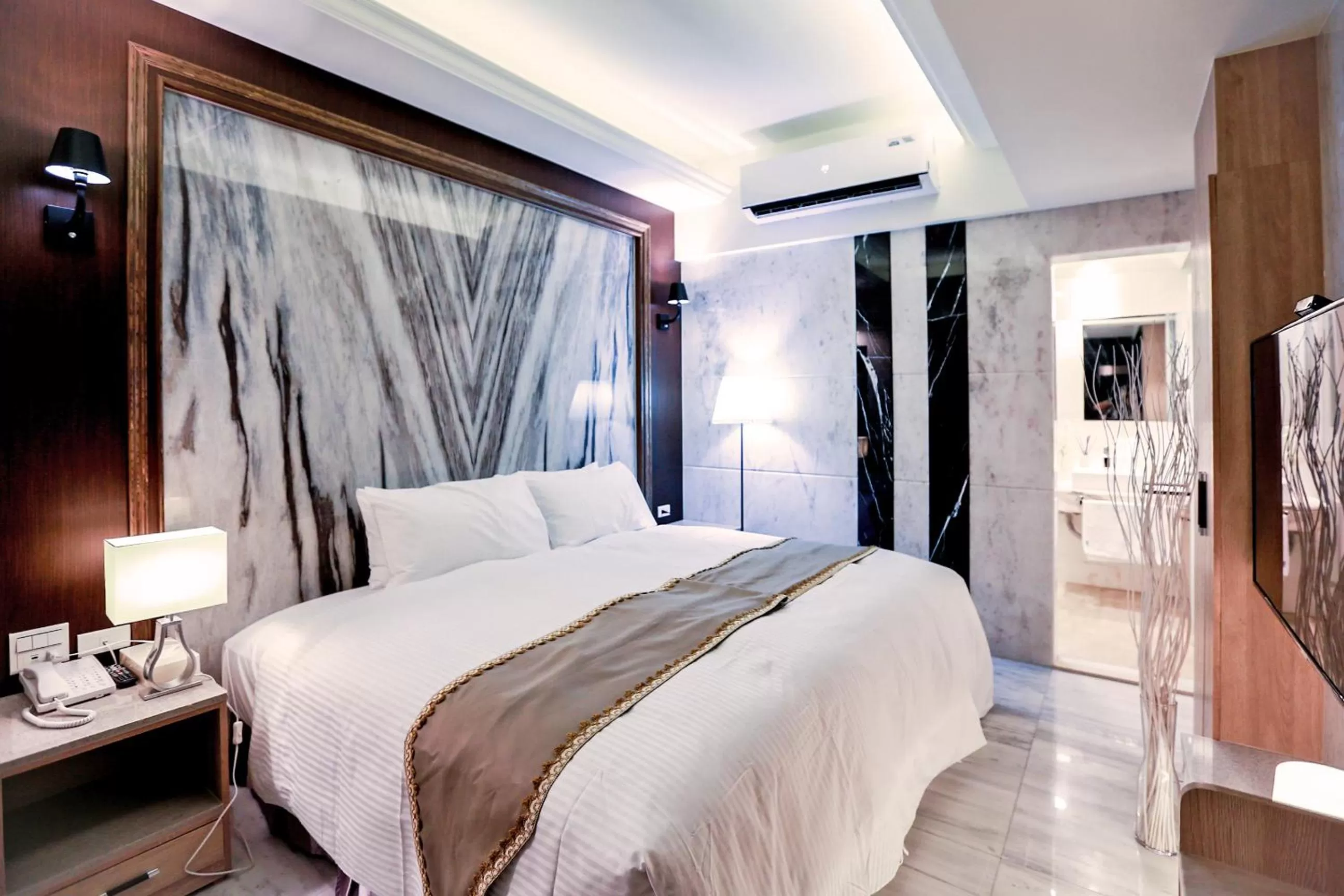 Bed in Hotel Maple Taiwan Boulevard