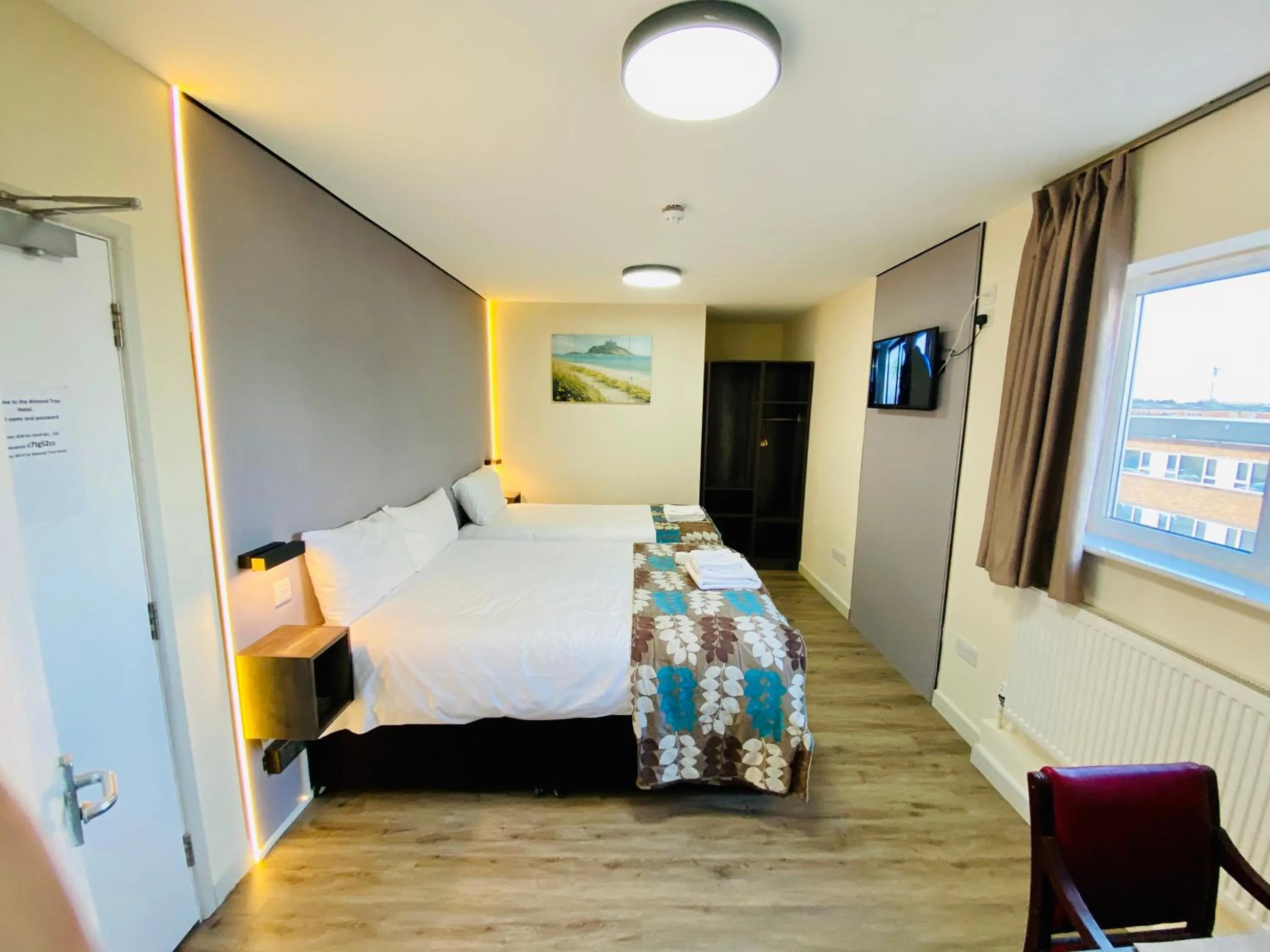 TV and multimedia, Bed in Almond Tree Hotel