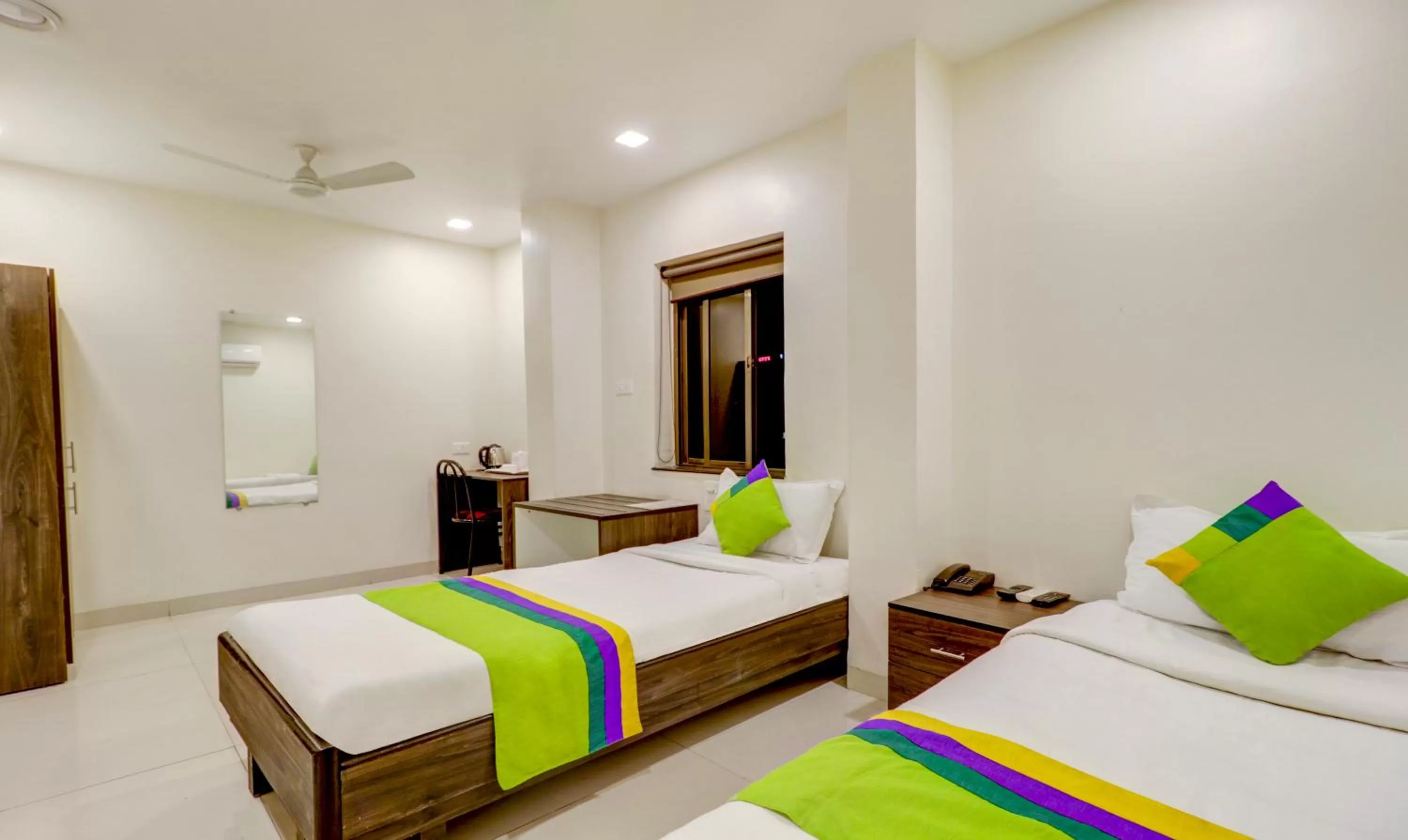 Bed in Treebo Trend Orange City