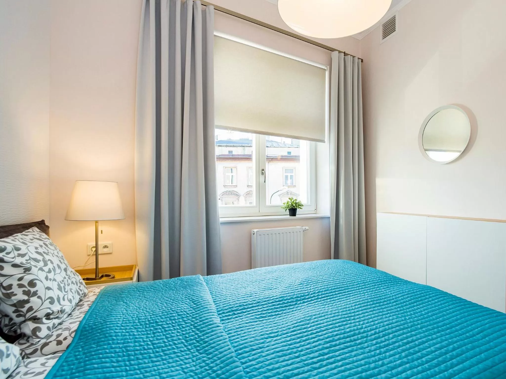 Bed in Riverside Aparthotel Cracow