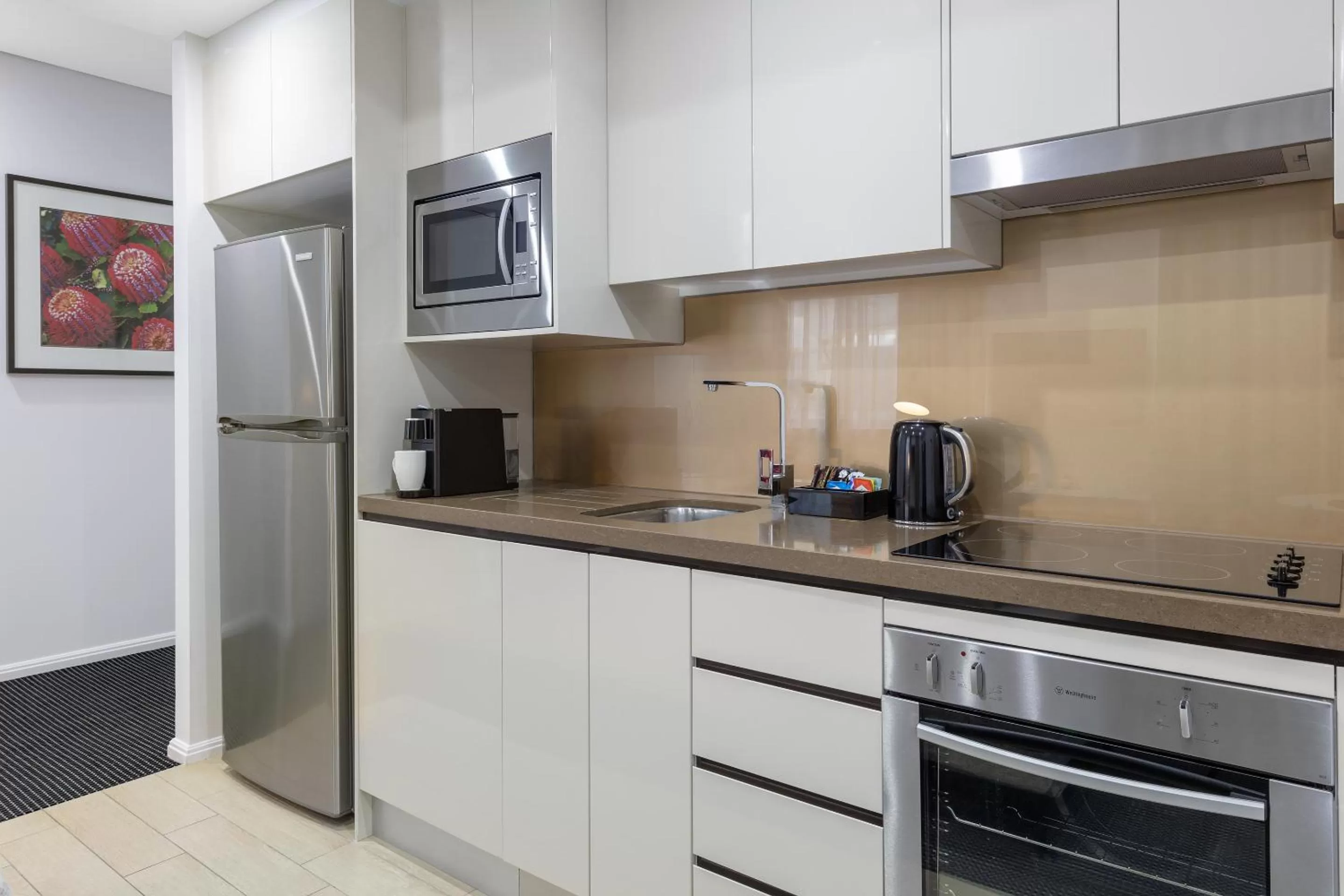 Kitchen or kitchenette in Meriton Suites North Ryde