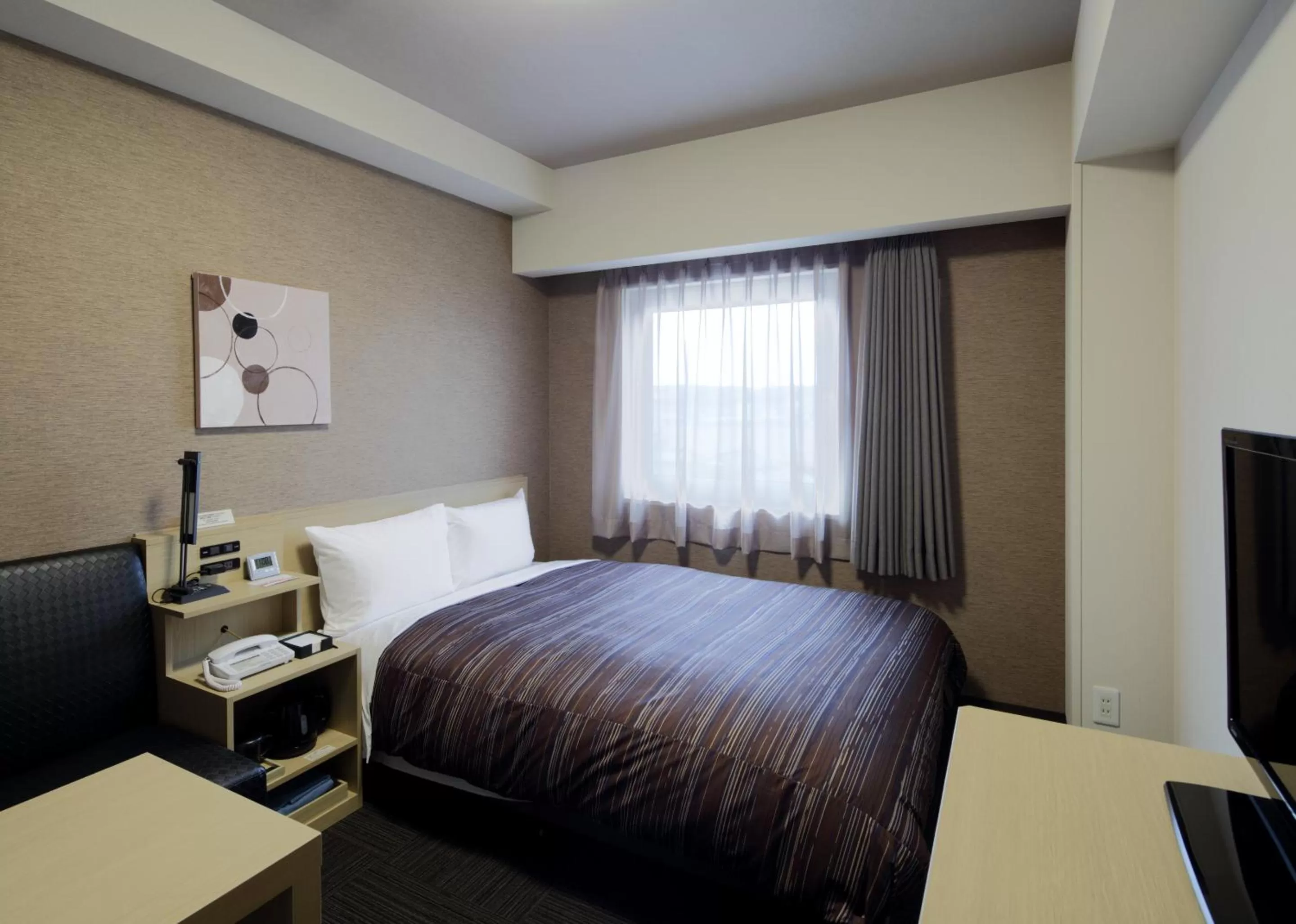 Bed in Hotel Route-Inn Hita Ekimae