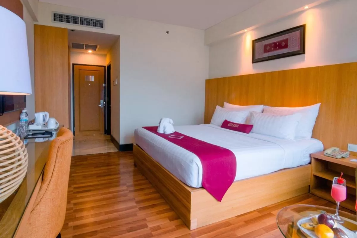 Bed in Emersia Hotel and Resort