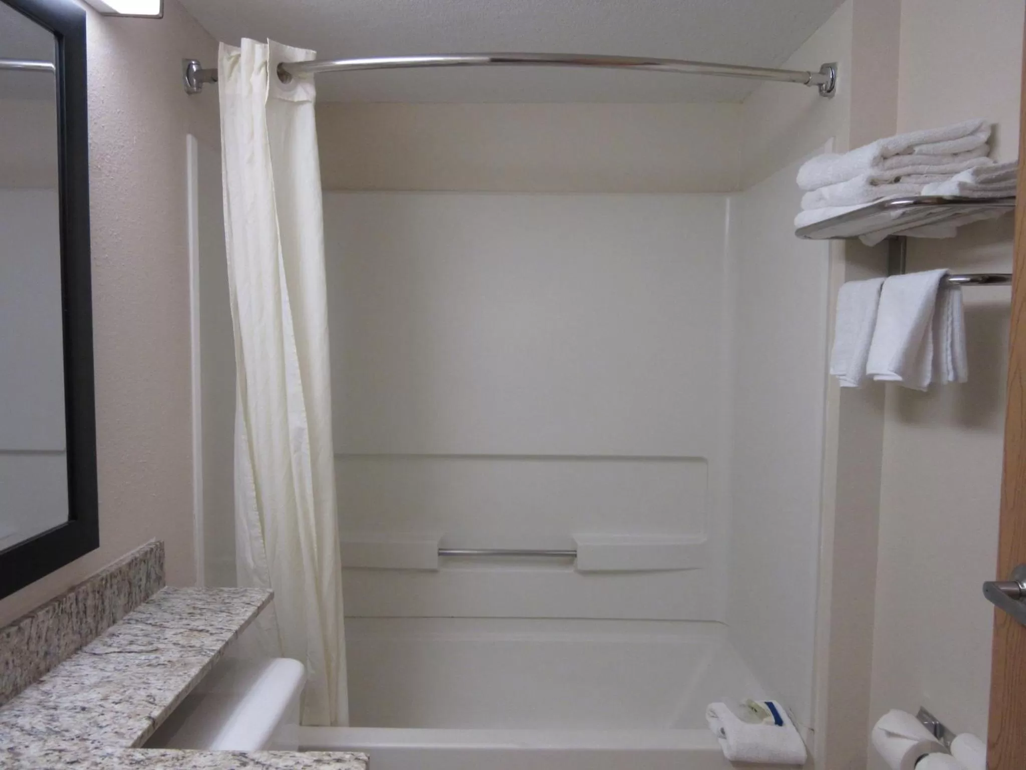 Bathroom in Travelodge by Wyndham Arlington/Dallas Area