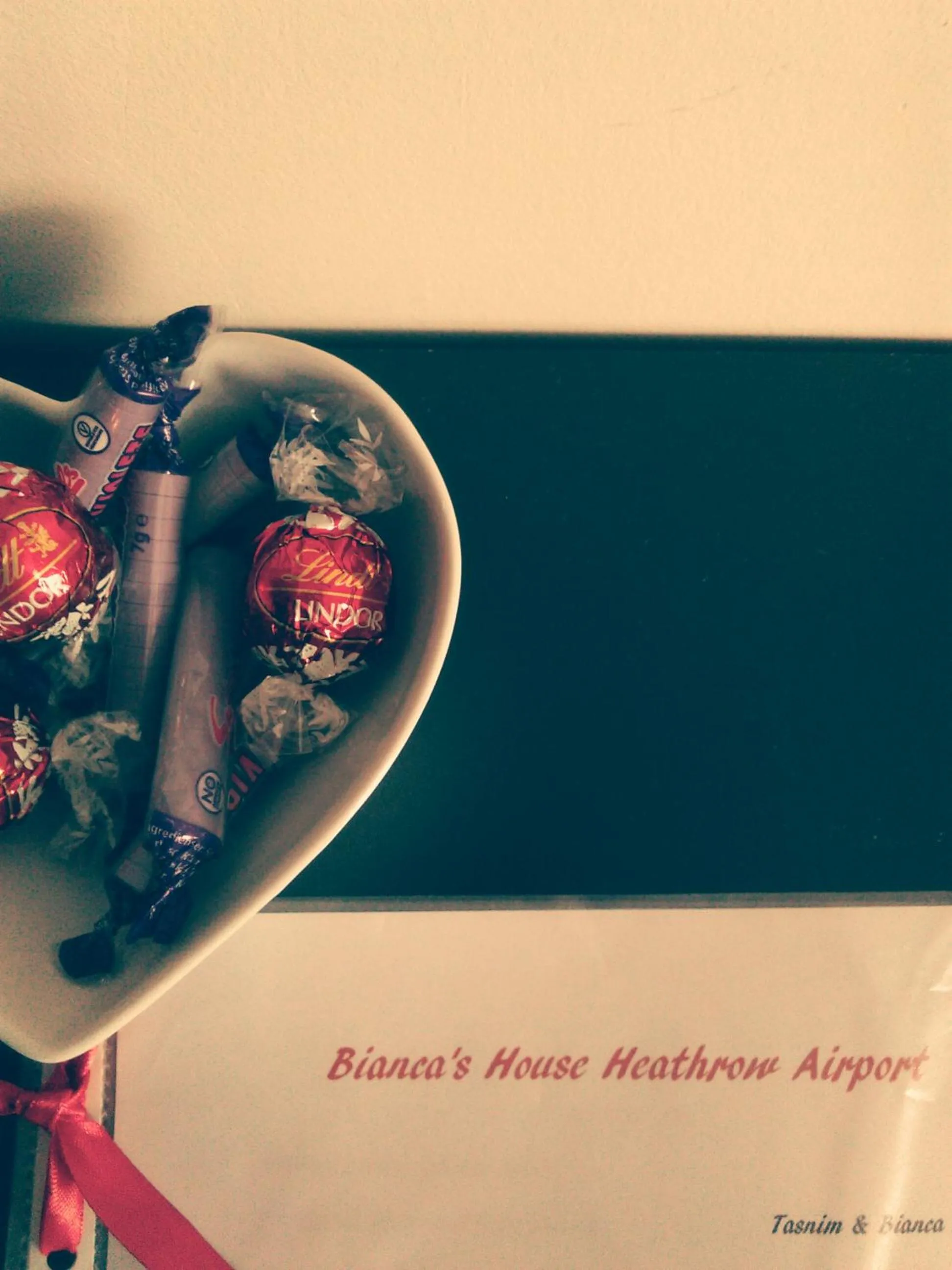 Property logo or sign in Bianca's House Hotel Heathrow Airport