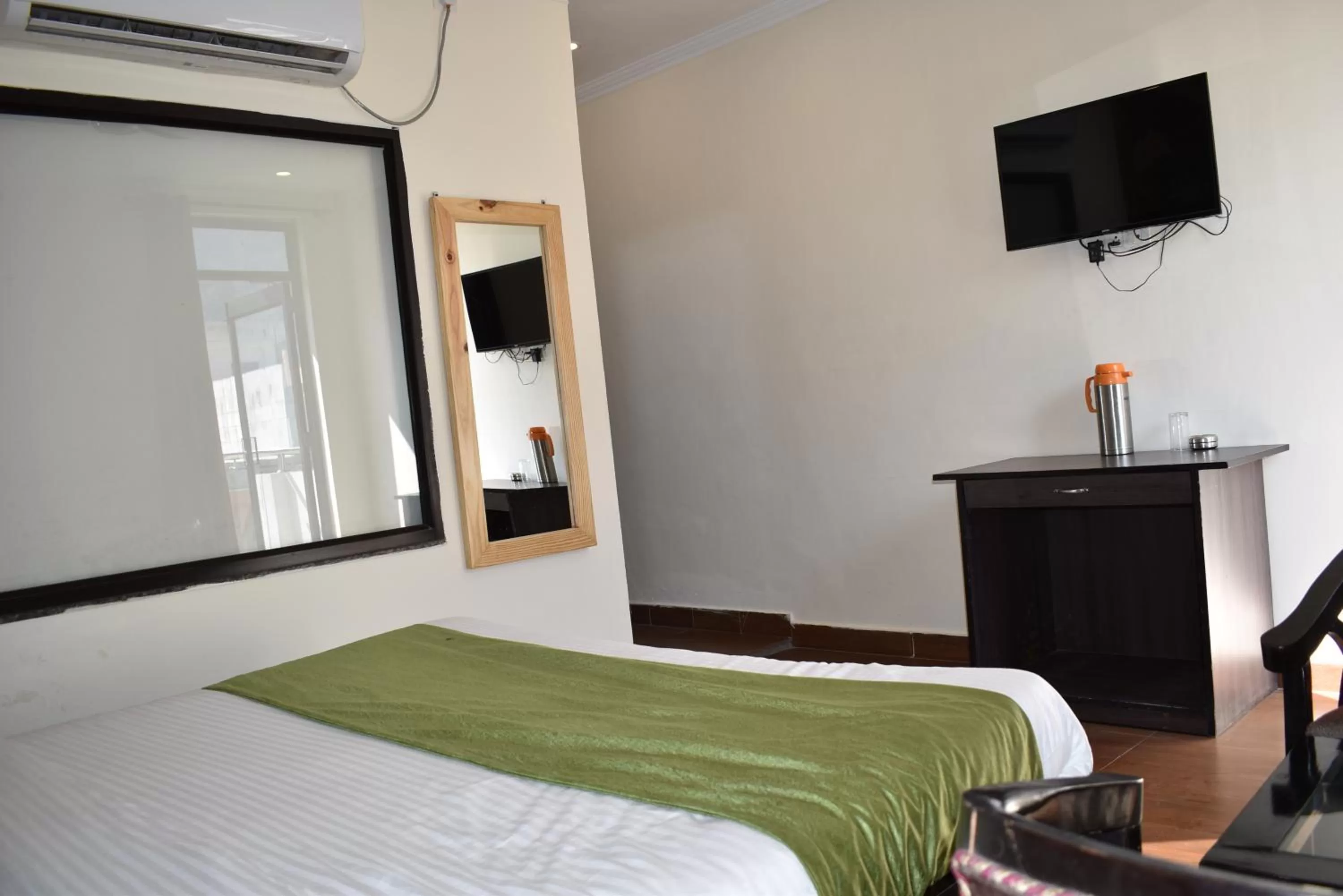 TV and multimedia, TV/Entertainment Center in Tapasthali by Meera Hotels