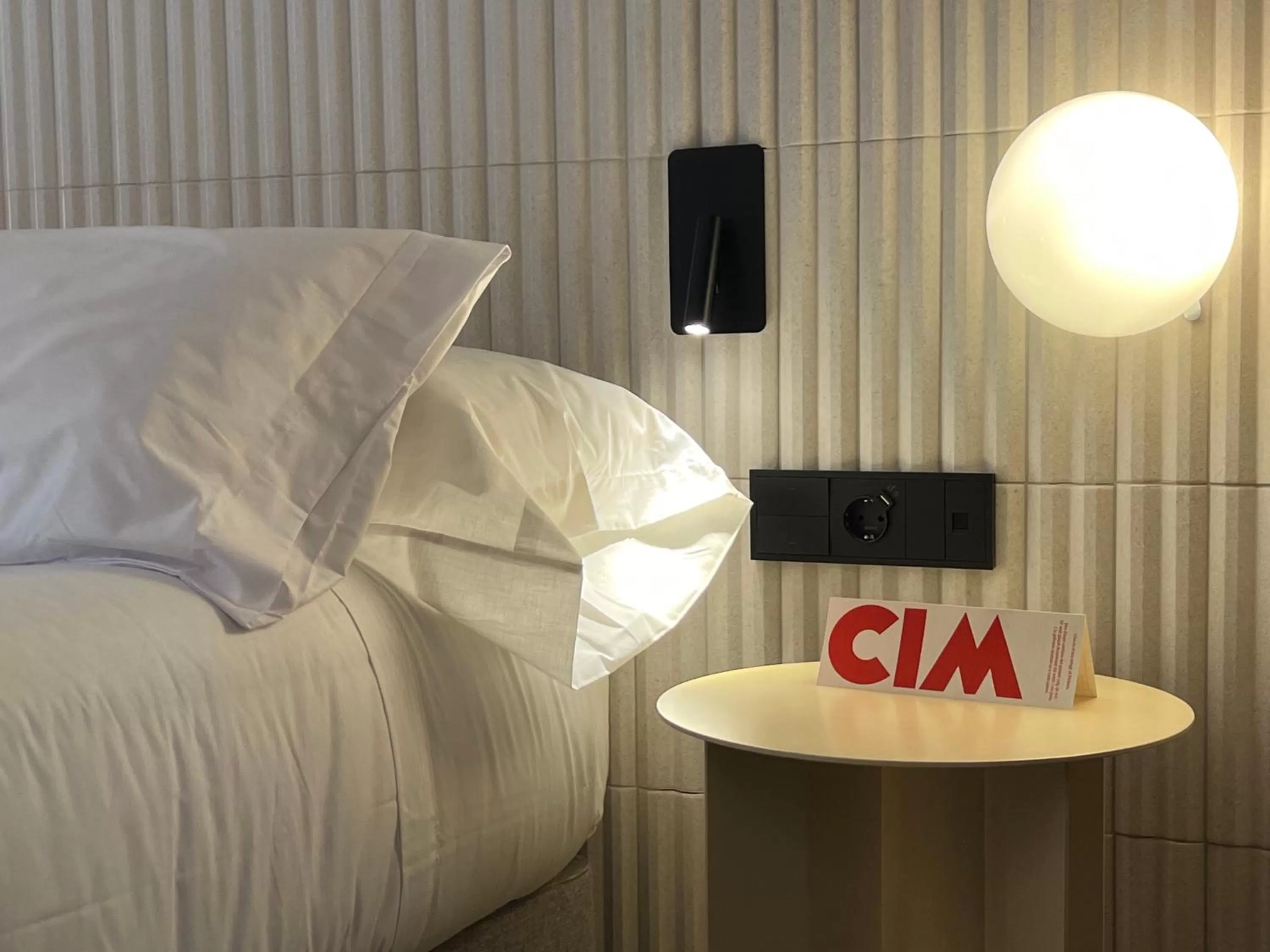 Bed in CIM HOTEL BOUTIQUE