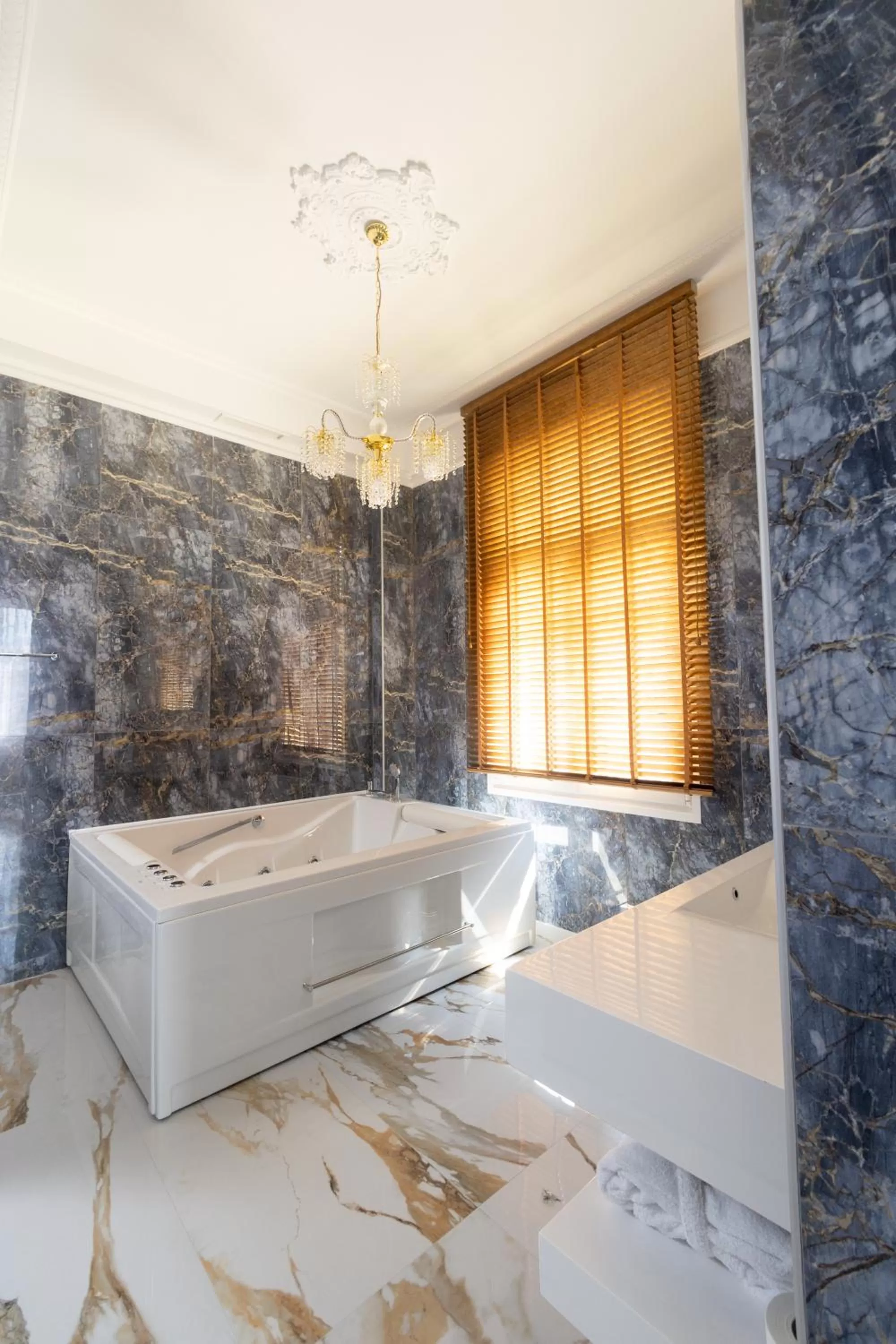 Bed in Modern Revival Luxury Hotel