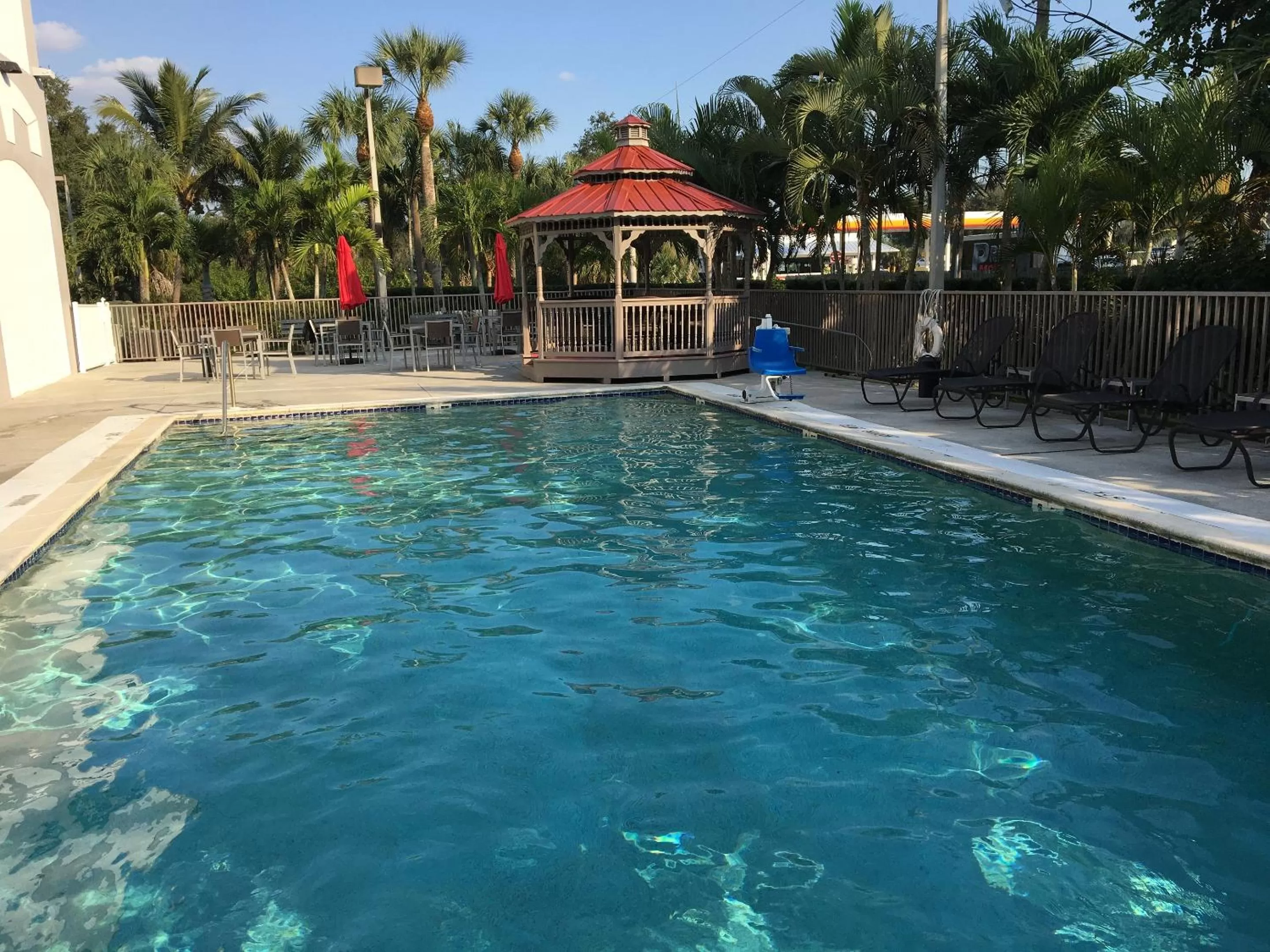 Swimming pool in Days Inn & Suites by Wyndham Bonita Springs North Naples