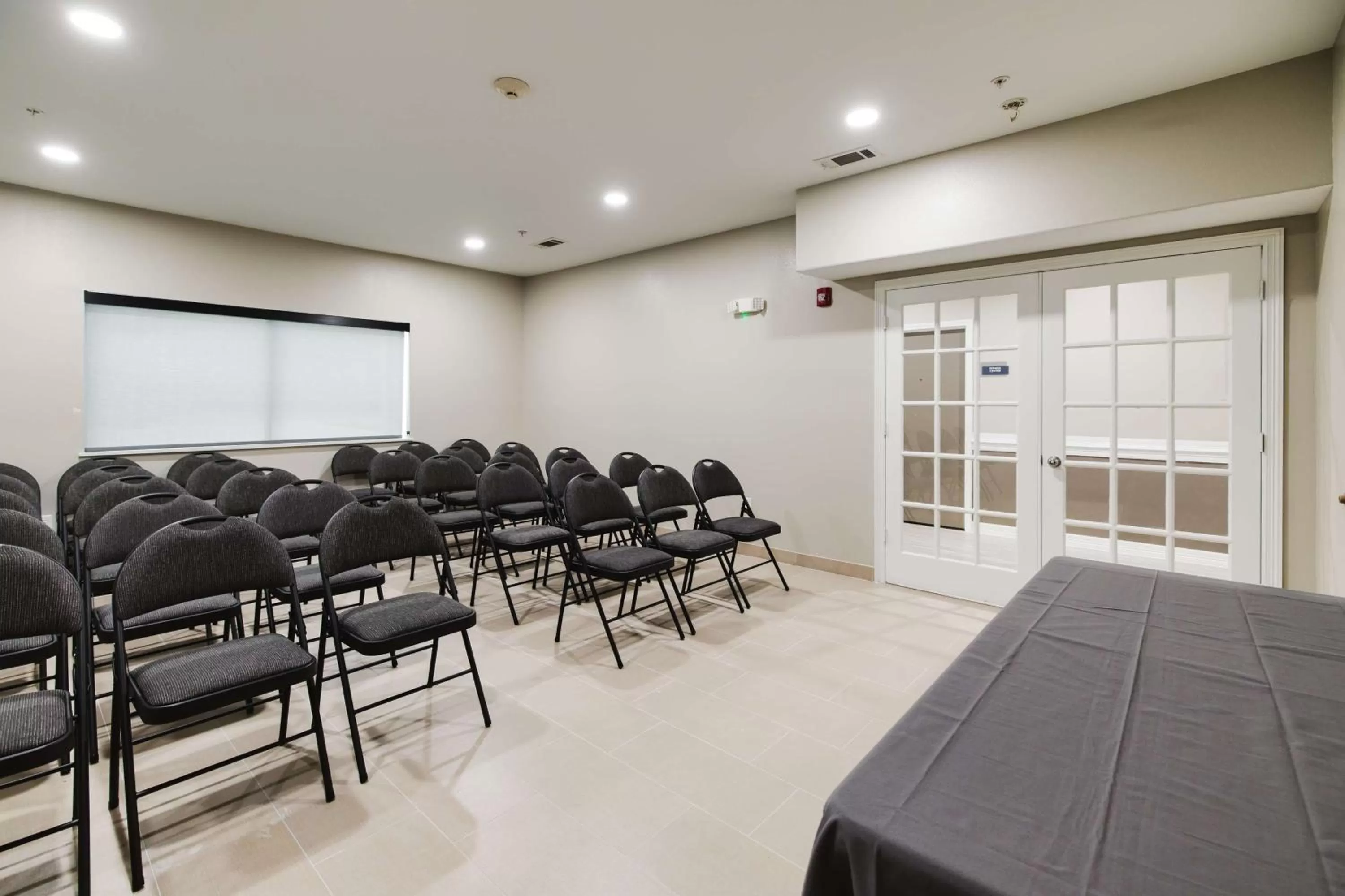 Meeting/conference room in SureStay Studio by Best Western Conroe Downtown