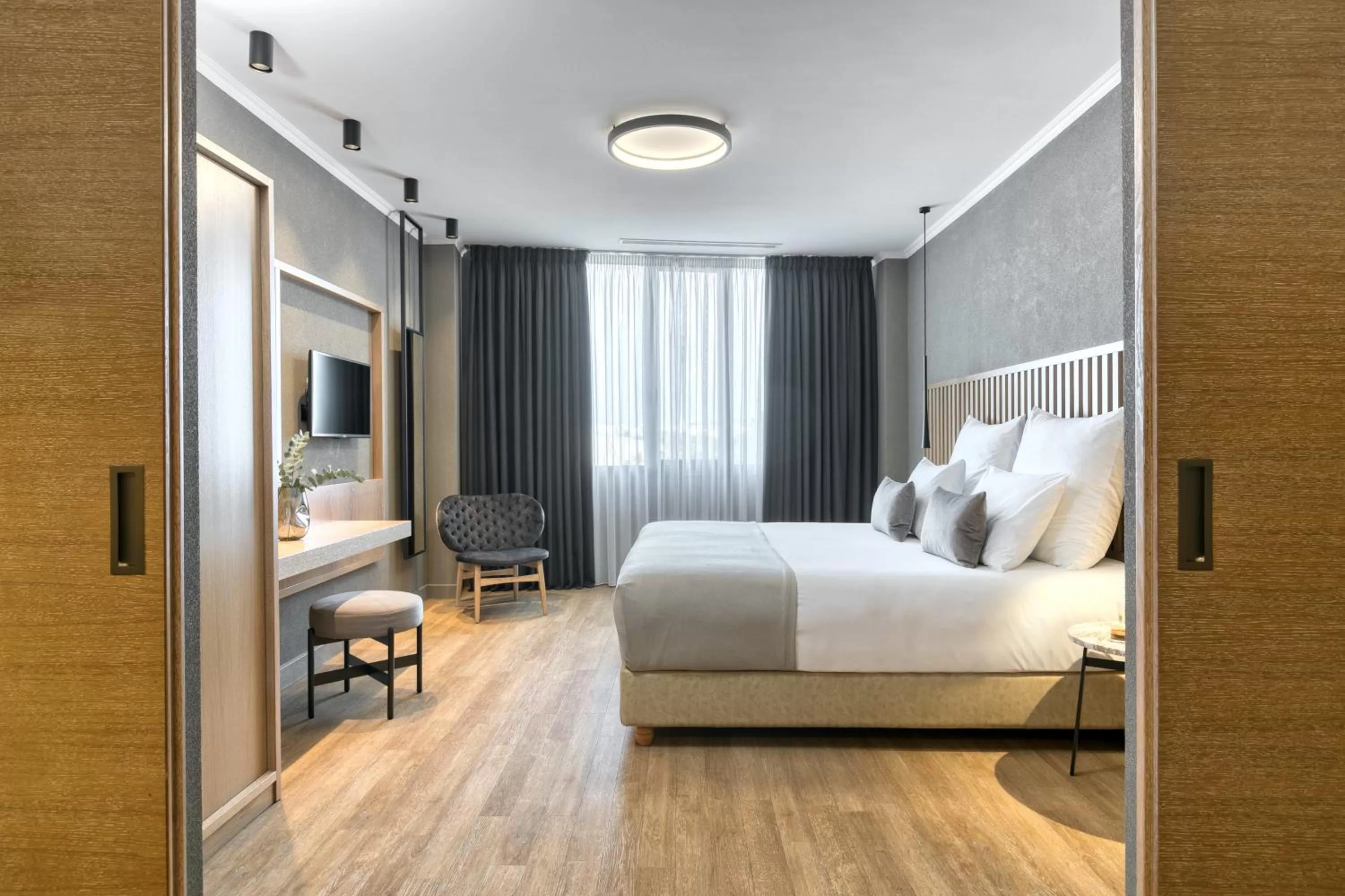 Bed in Porto Palace Hotel Thessaloniki