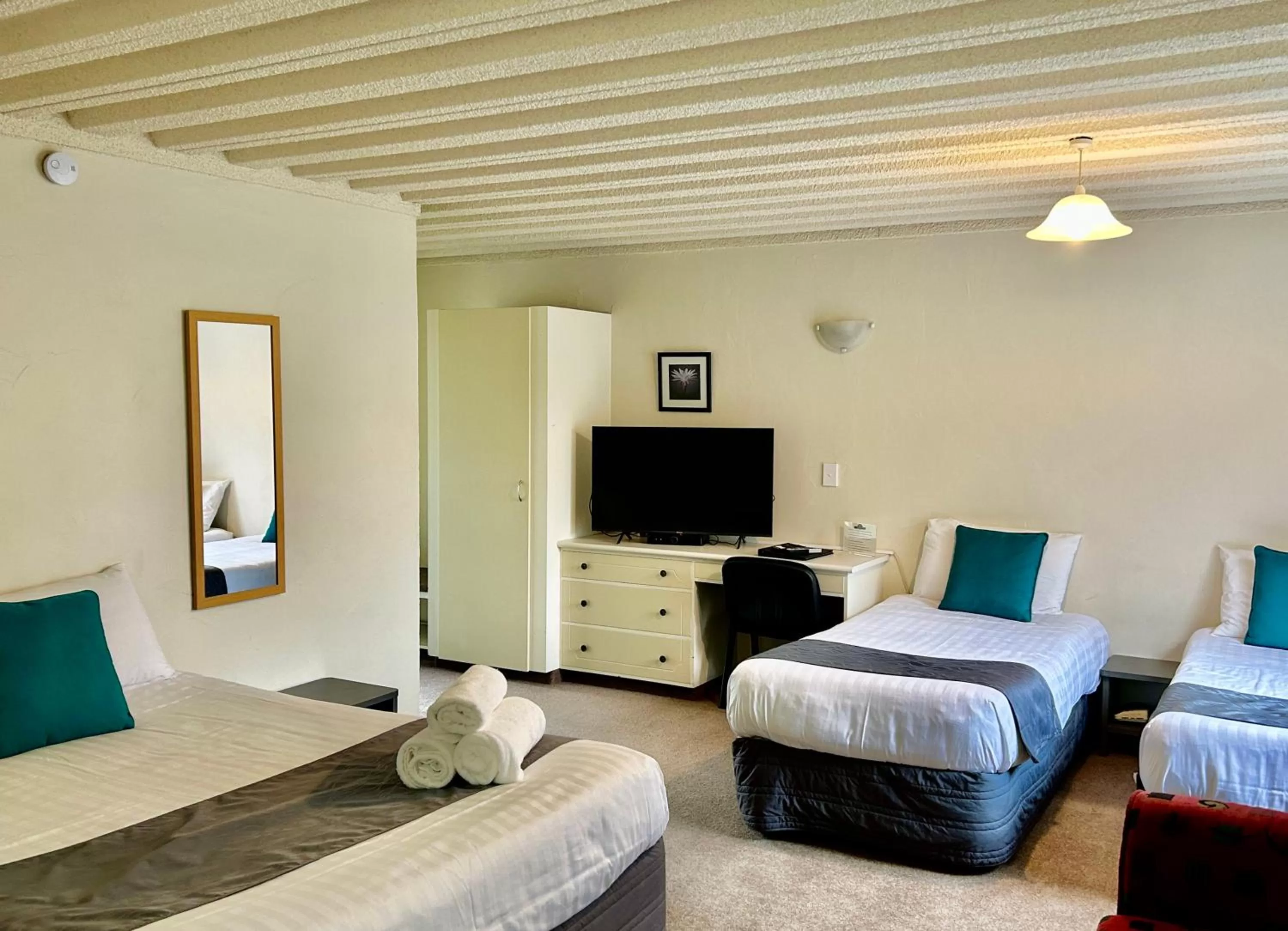 Bed in Parkside Motel and Apartments