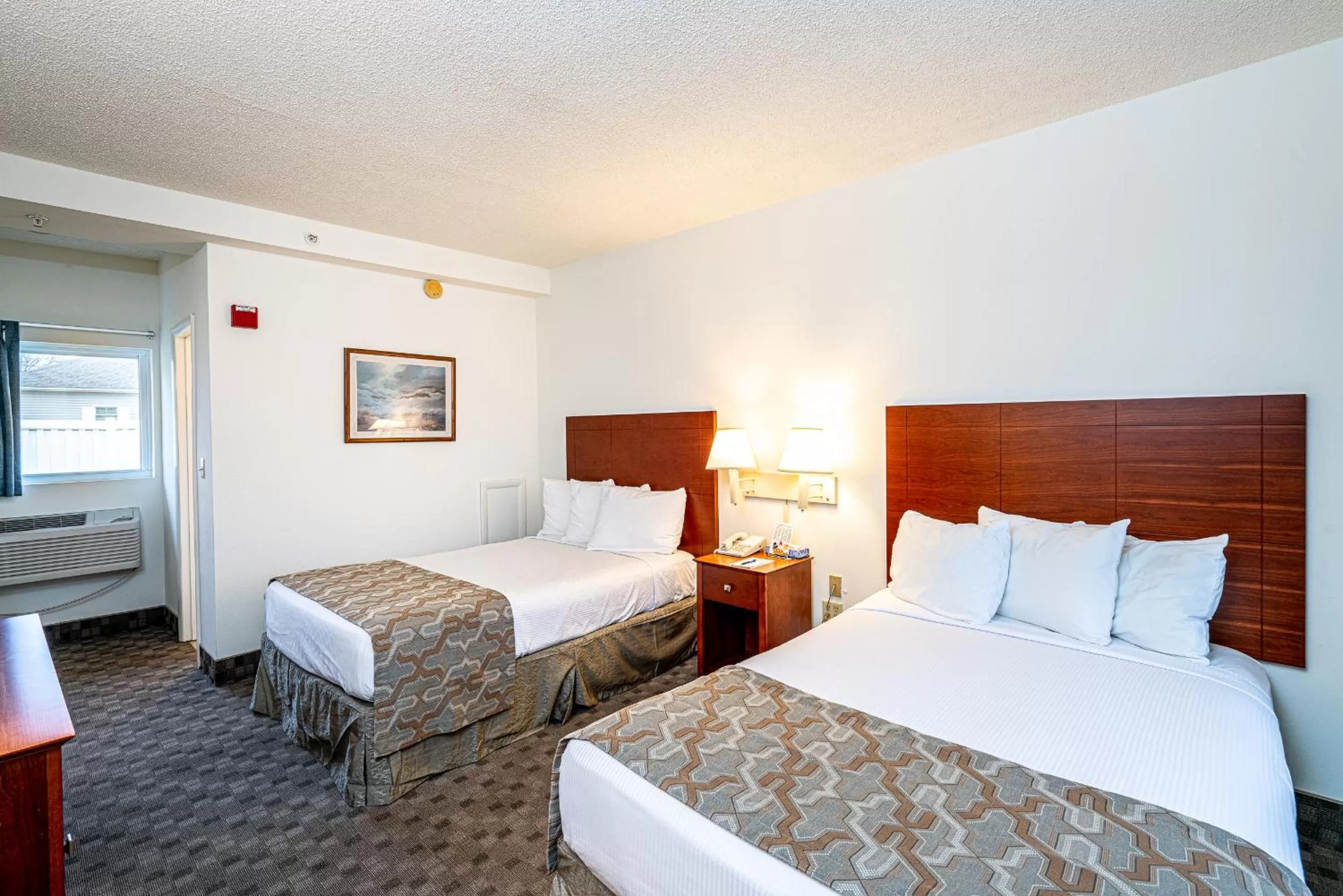 Bed in Anchorage Motel Inc.