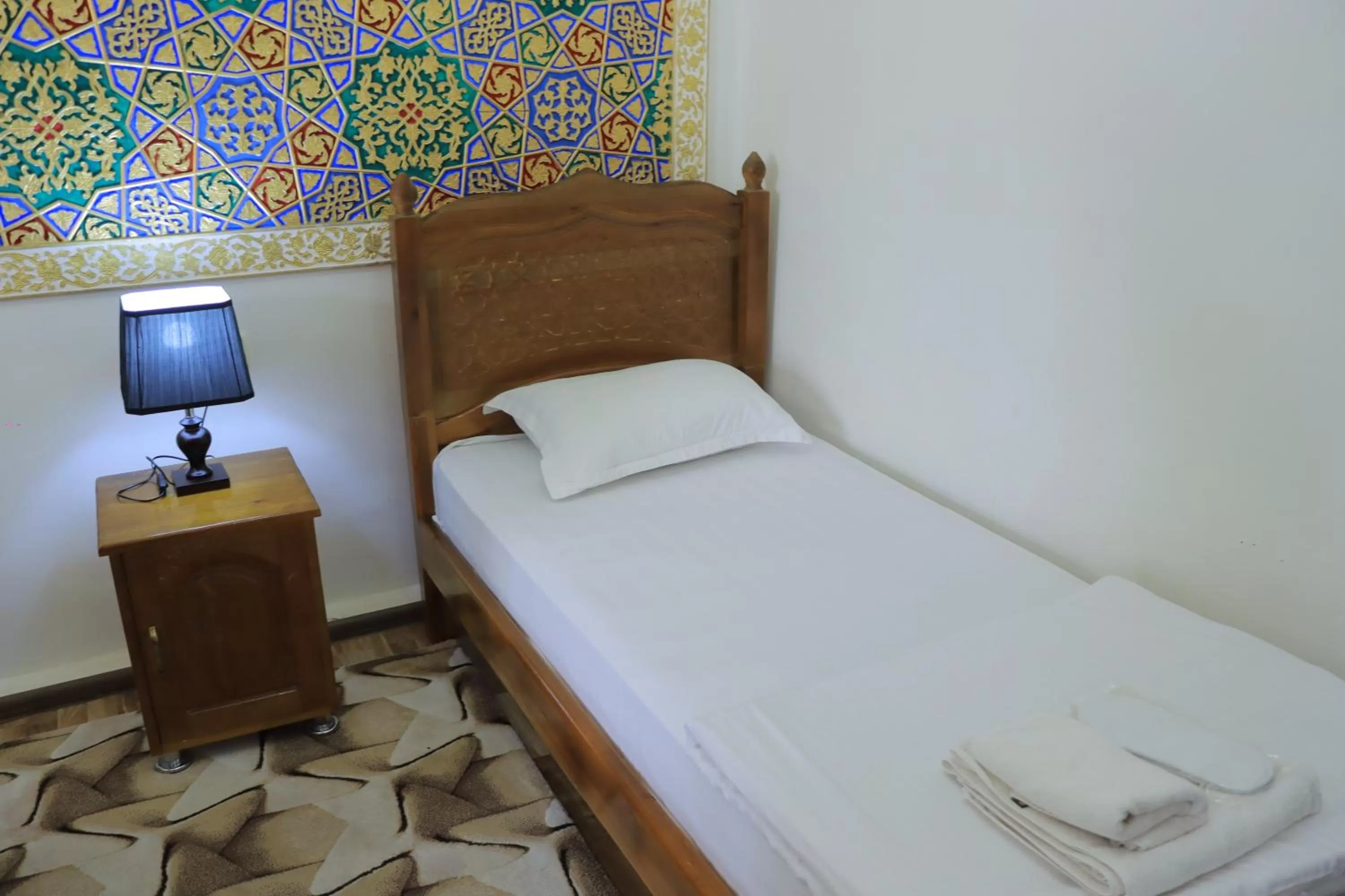 Photo of the whole room, Bed in Bukhara Baraka Boutique Hotel