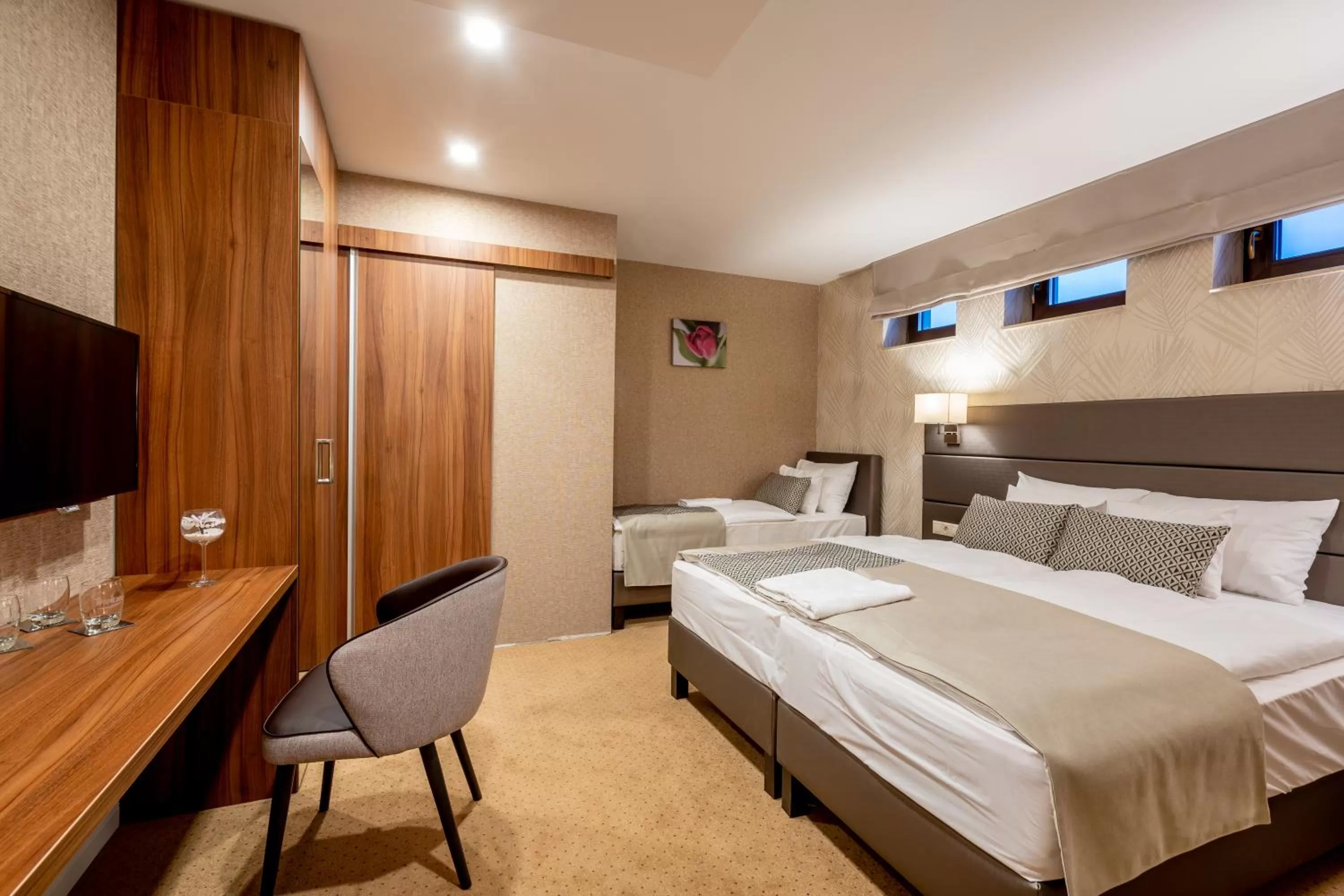 Bed in DorEsz Wellness Panzió