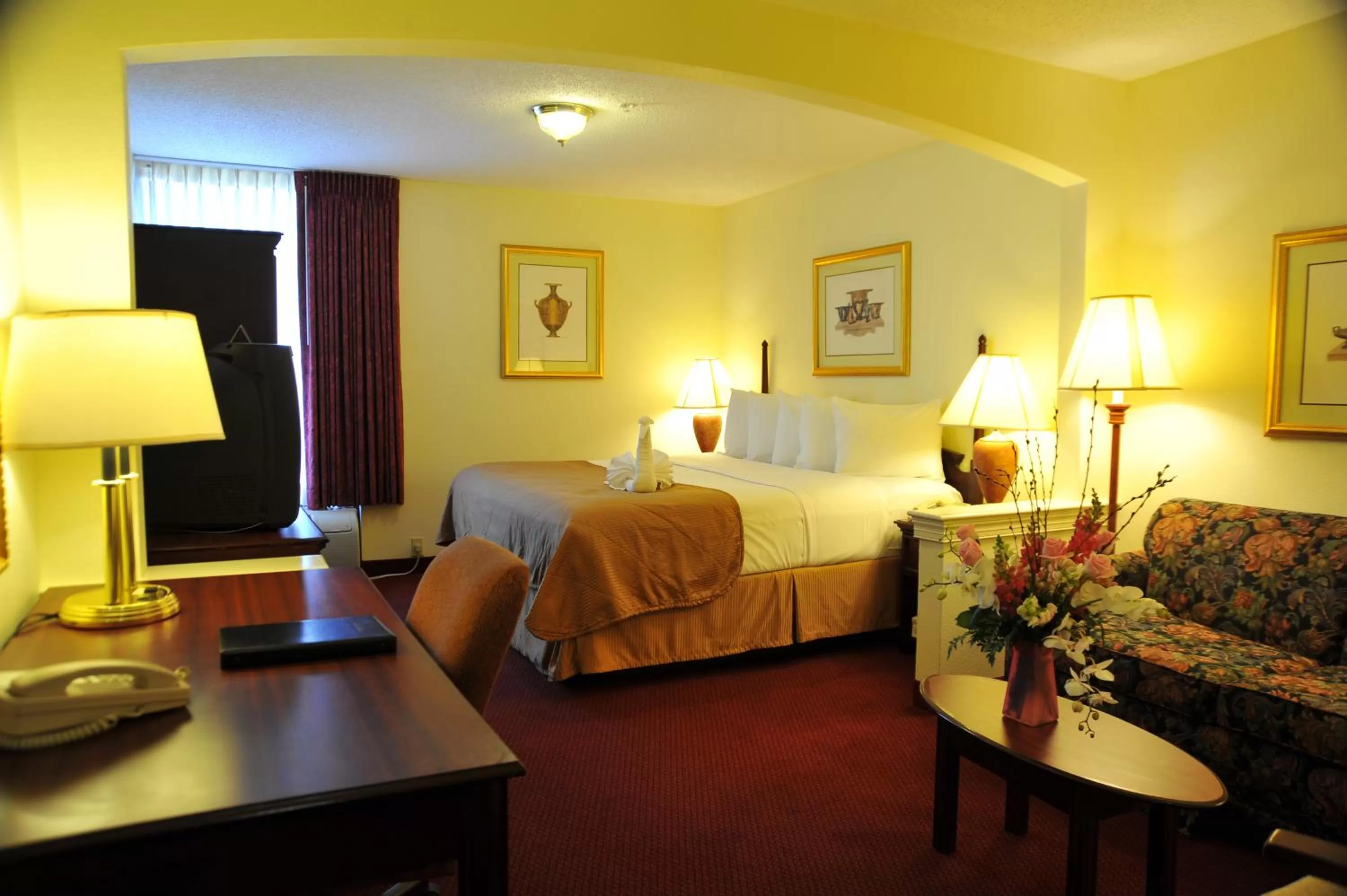 Bed in Opal Hotel & Suites