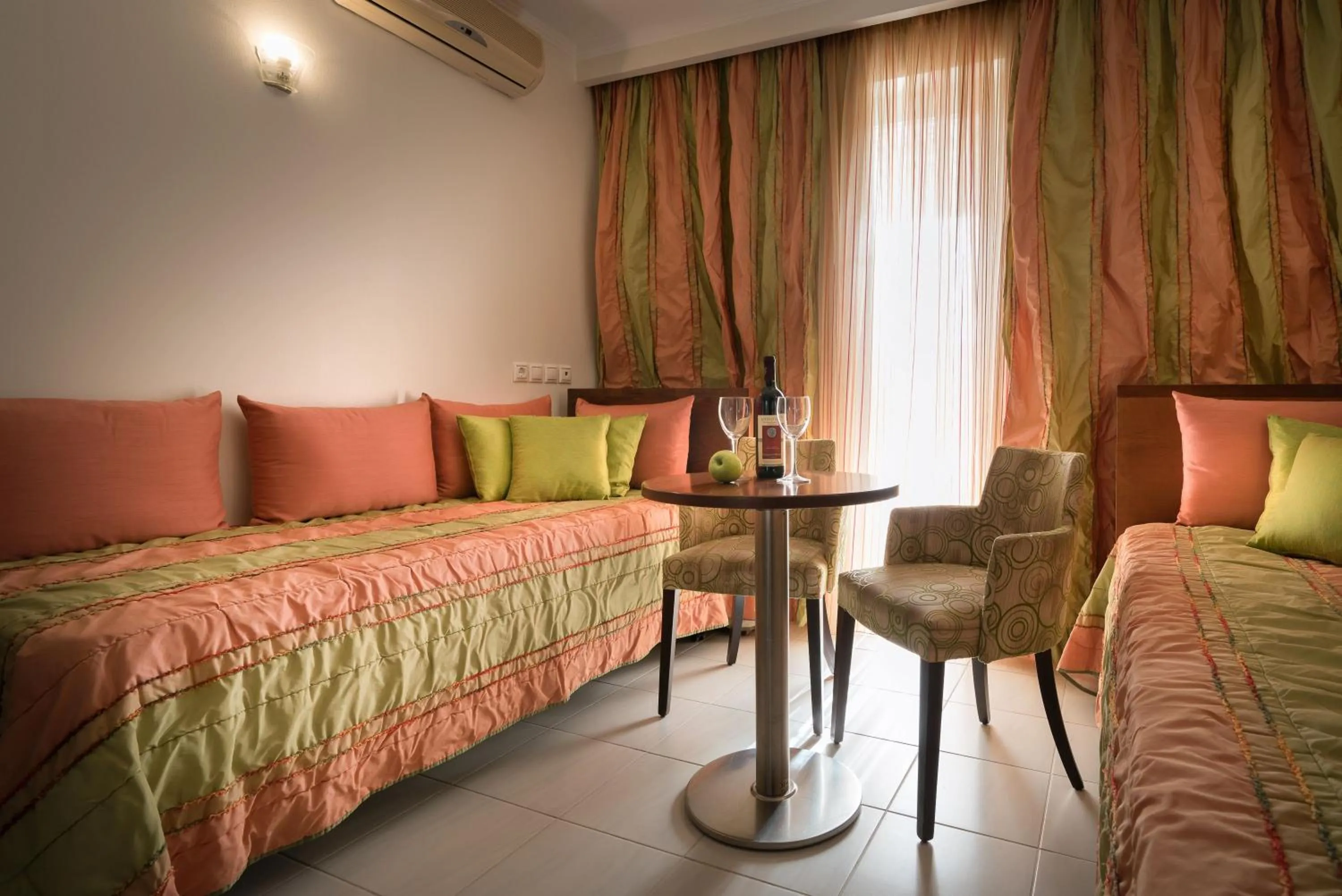 Living room, Bed in Galaxy Beach Resort BW Premier Collection