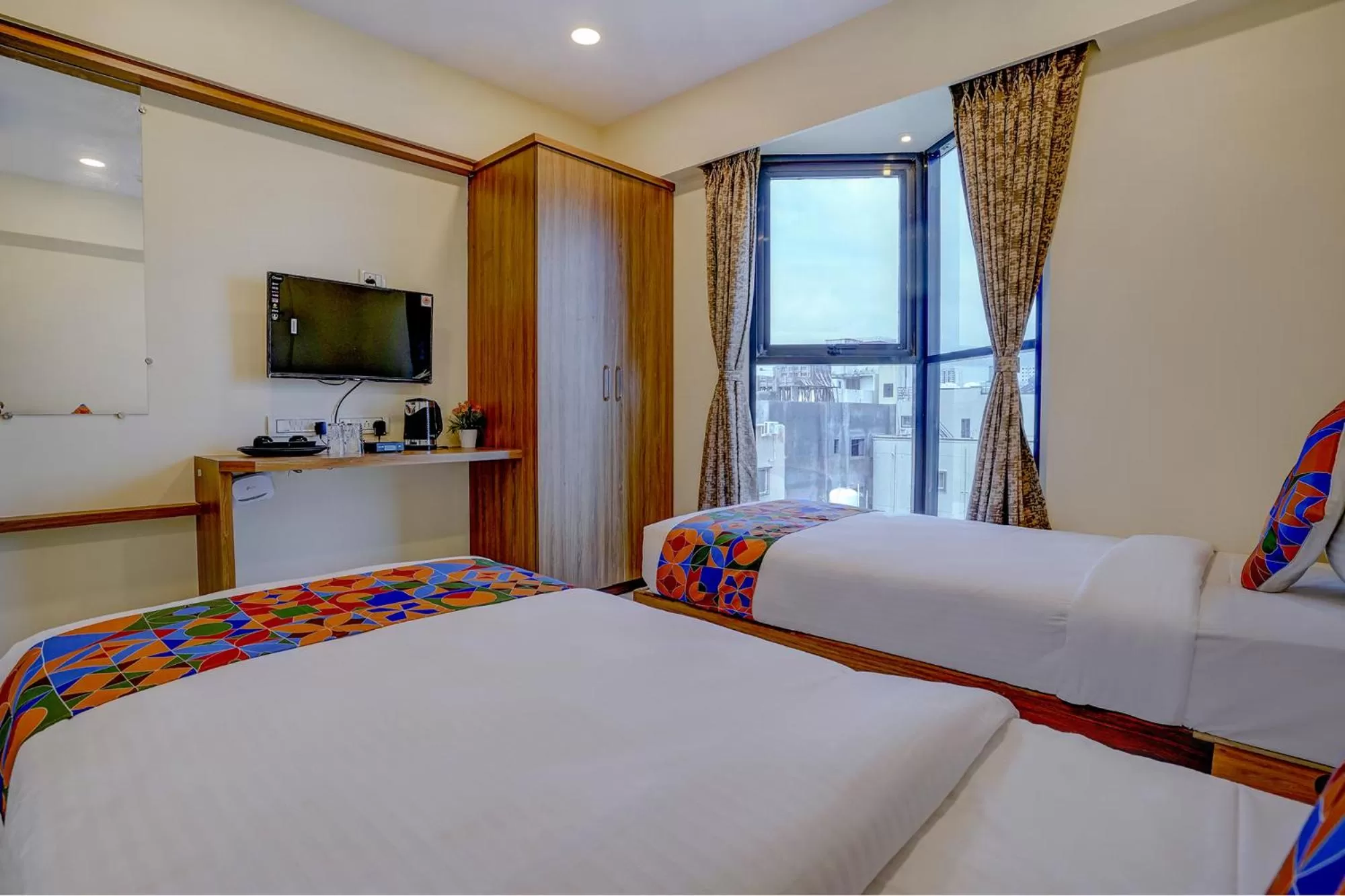 Bed in FabHotel Crystal Homes - nr Rajaram Bhiku stadium