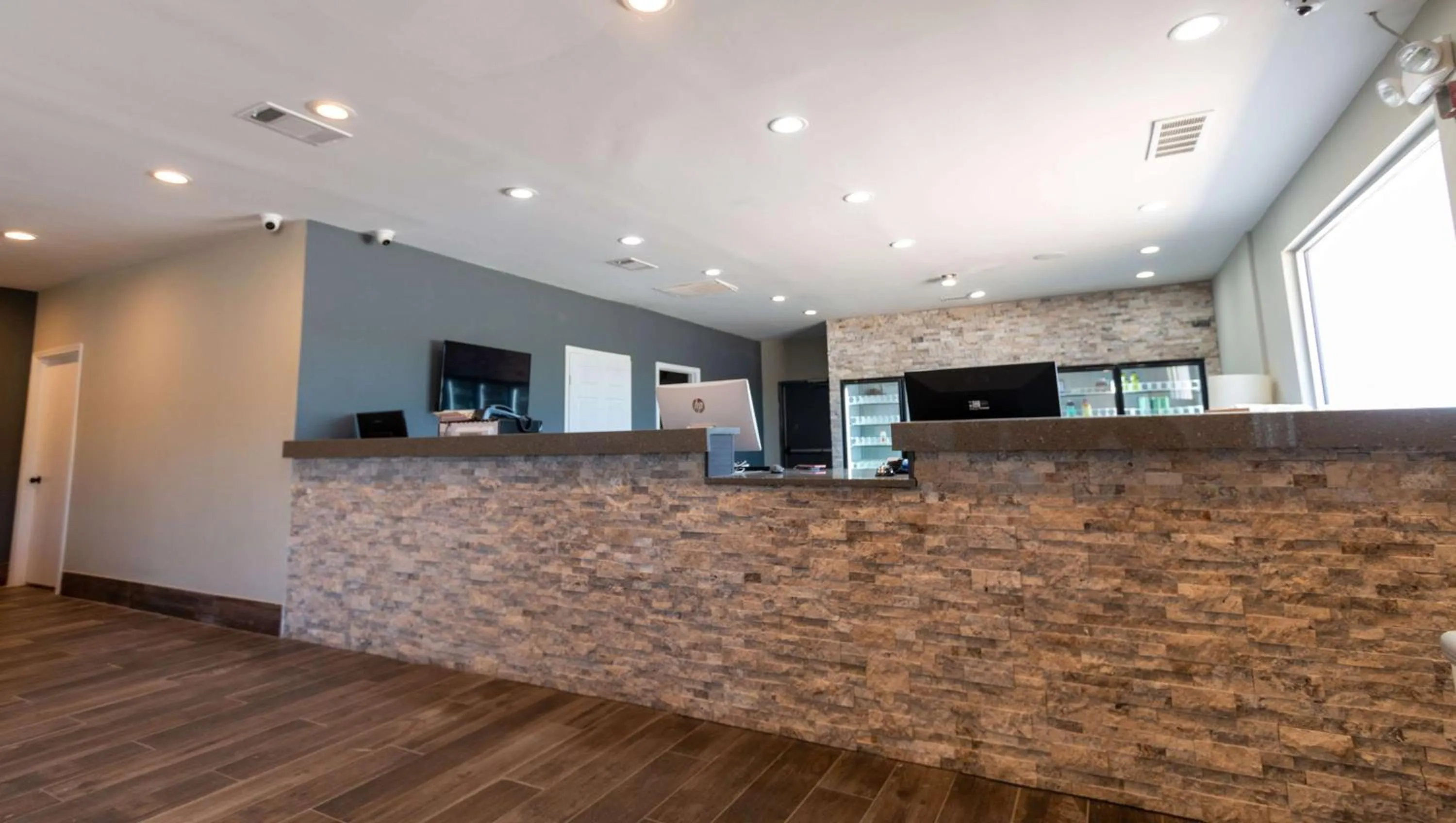 Lobby or reception in Magnuson Extended Stay and Suites Airport Hotel