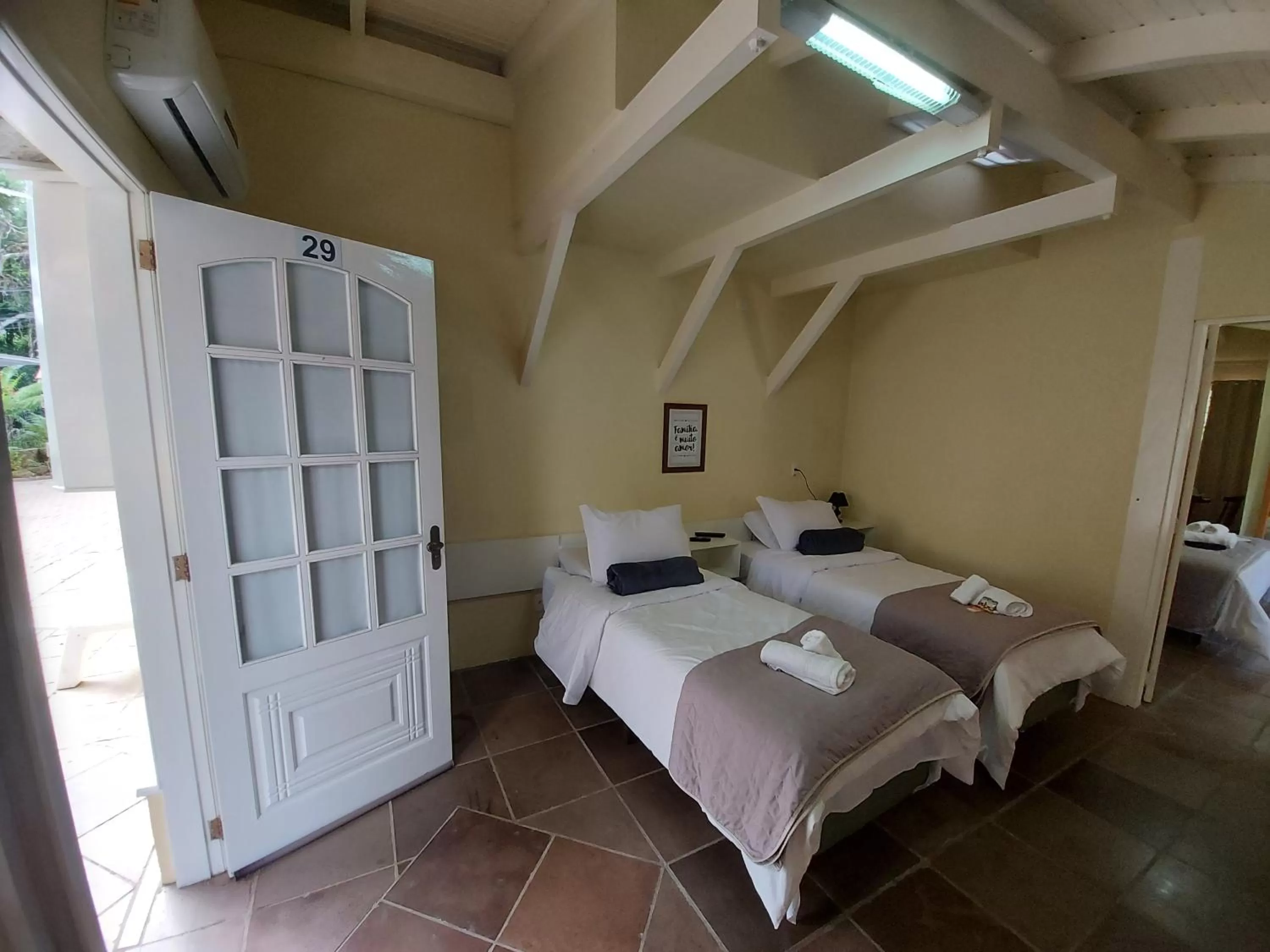 Bed in Pousada Lanai Canela