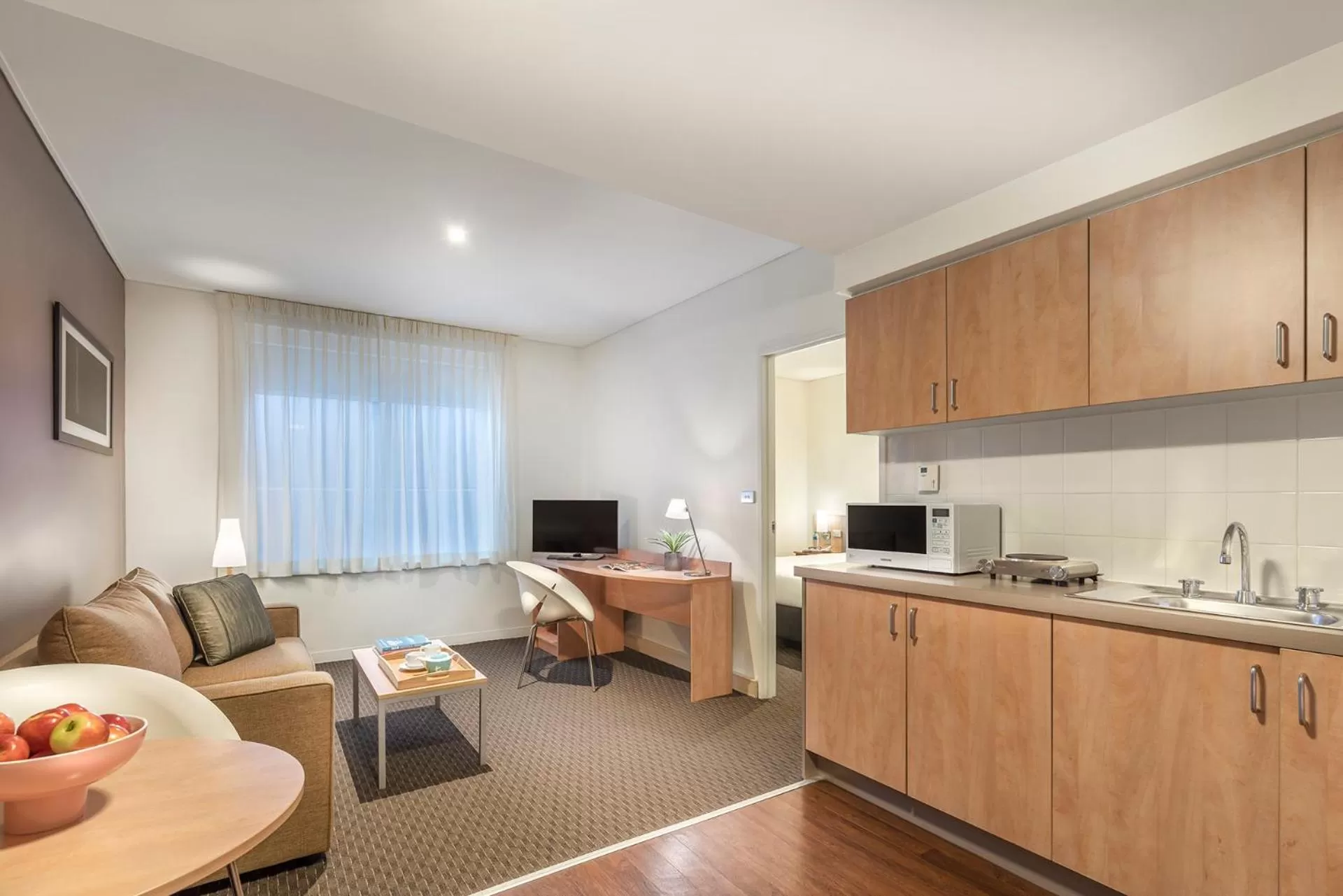 Kitchen or kitchenette in ibis Melbourne Hotel and Apartments