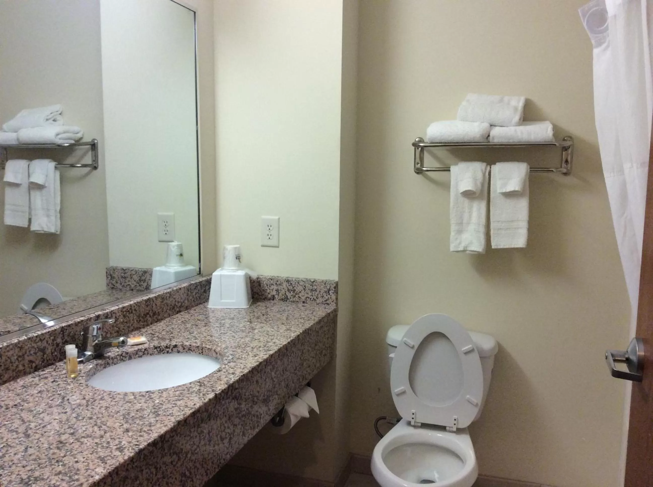 Bathroom in Days Inn by Wyndham Greensboro NC