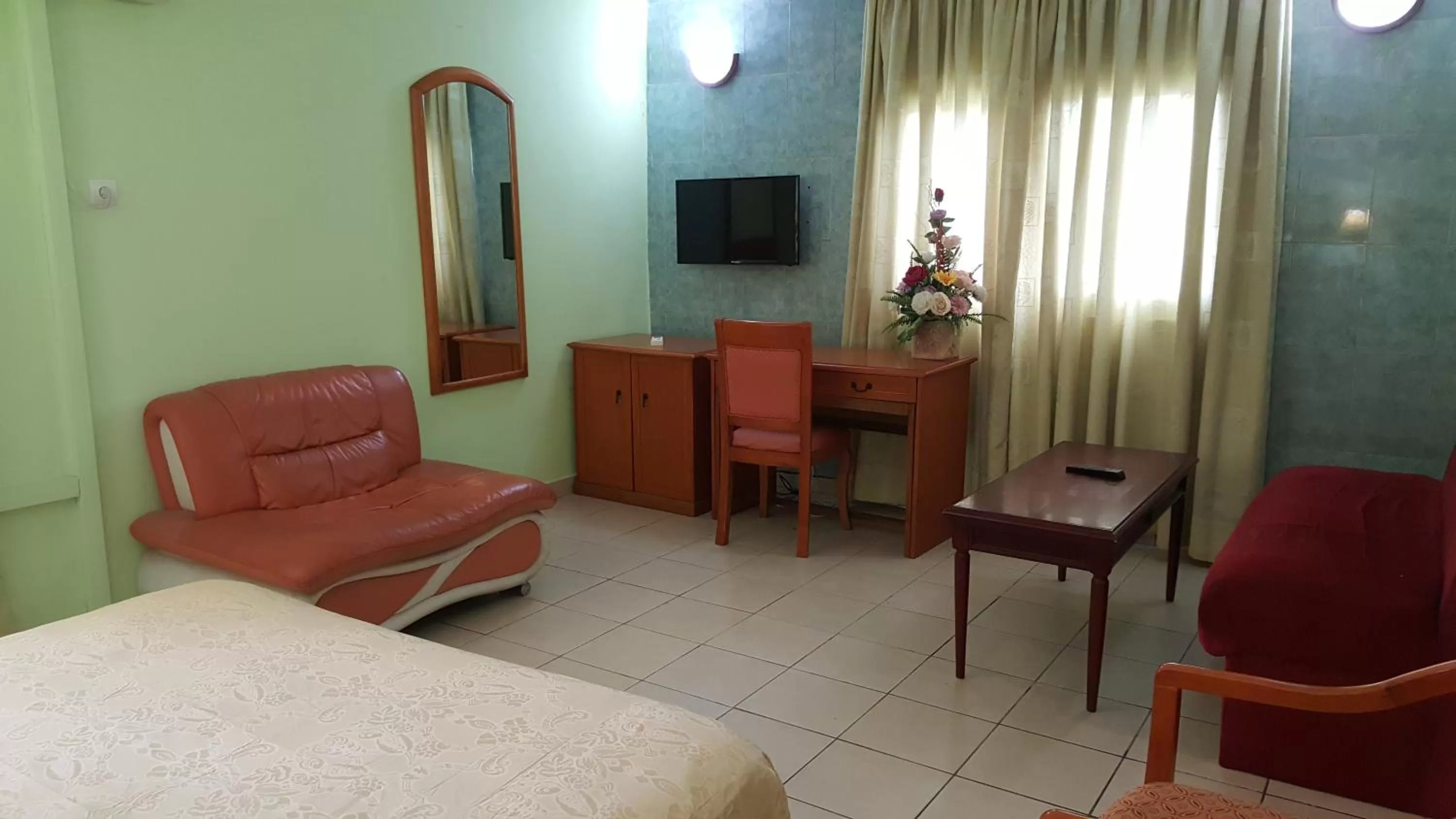 Photo of the whole room, Seating Area in Peninsula Hotel Douala