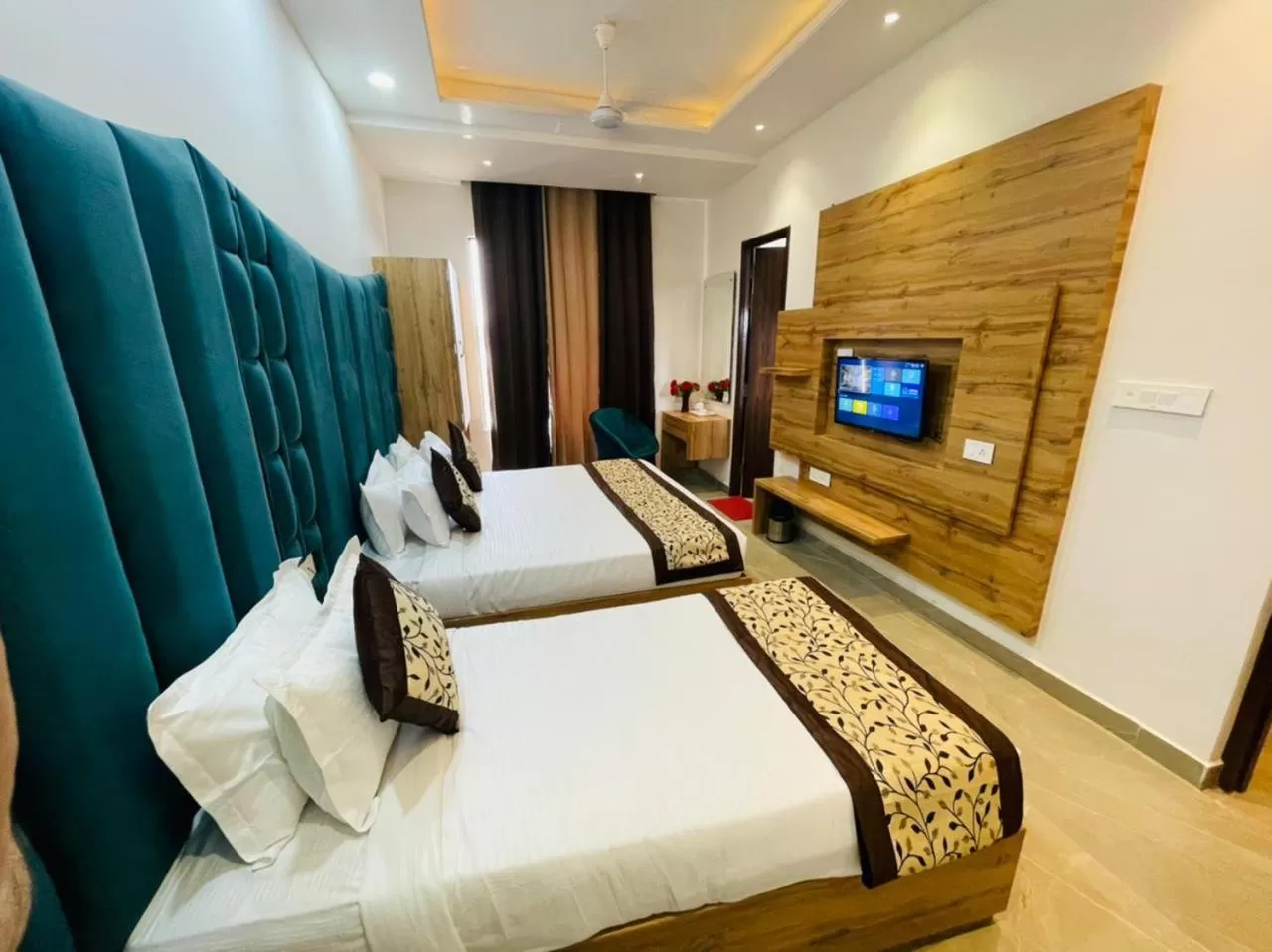 Photo of the whole room in Hotel Dream Town By Cozy Hotels & Resorts