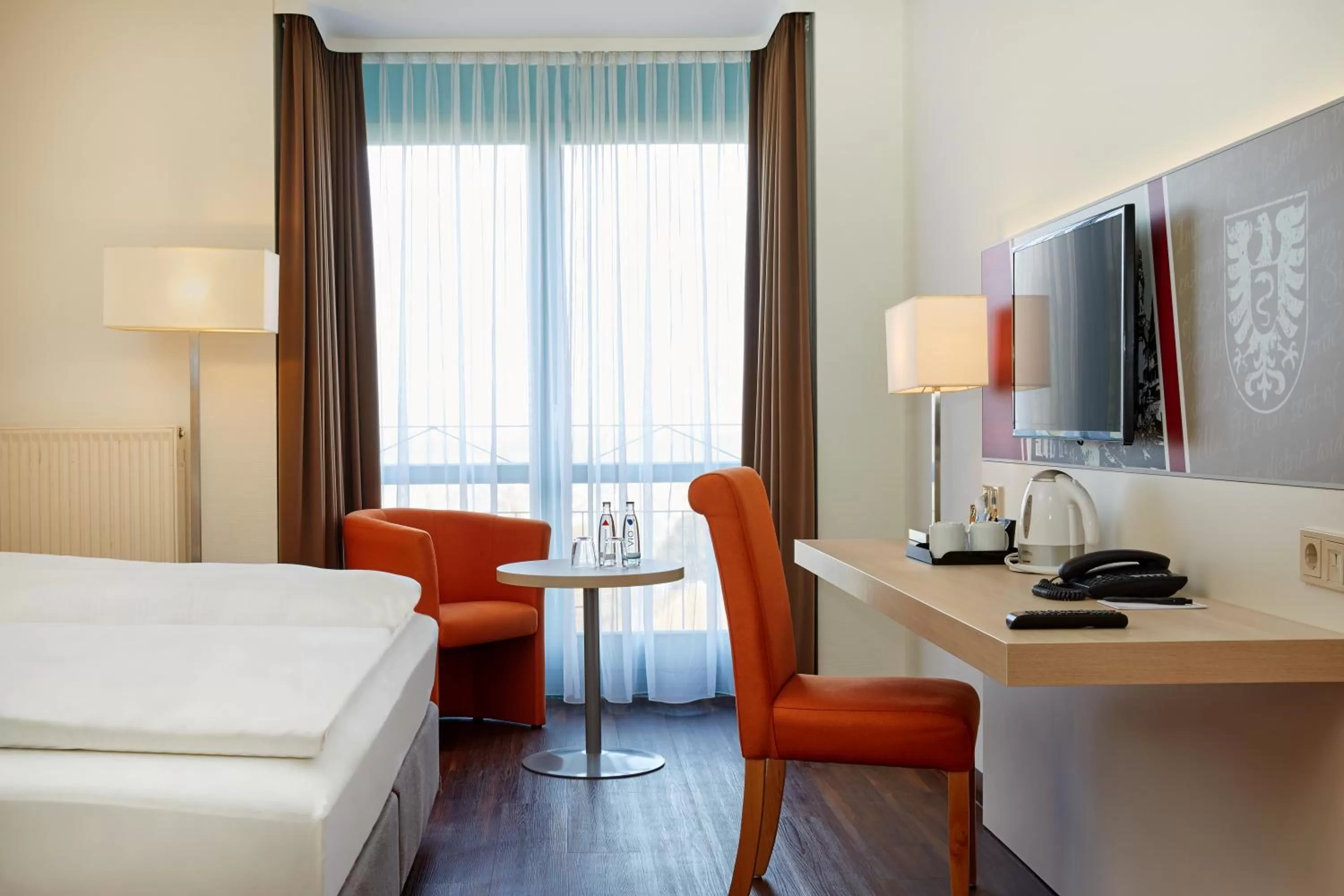 Bedroom, Bed in H+ Hotel Limes Thermen Aalen