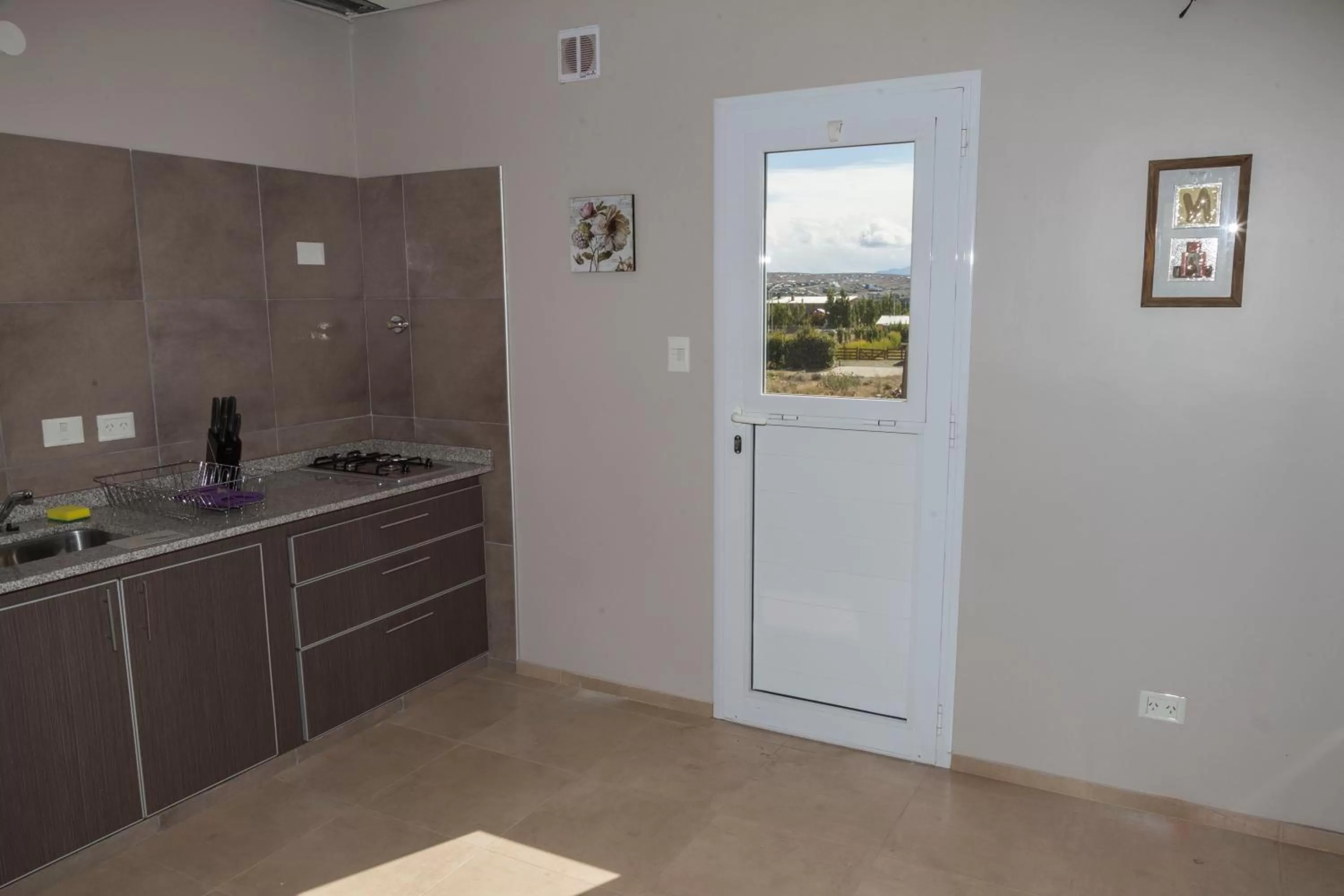 Kitchen or kitchenette in Tierra Tehuelche Hostería y Aparts