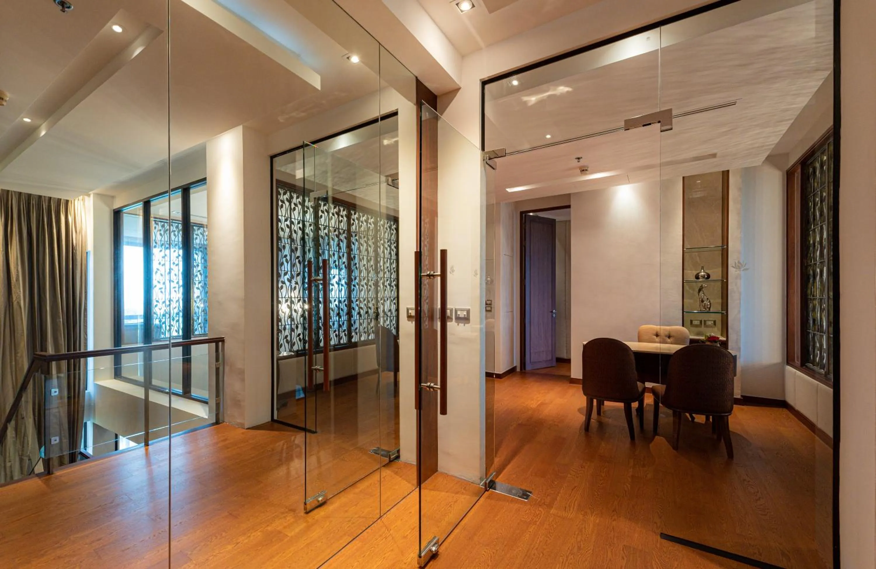 Living room in Summit Windmill Golf Suite Hotel at Suvarnabhumi