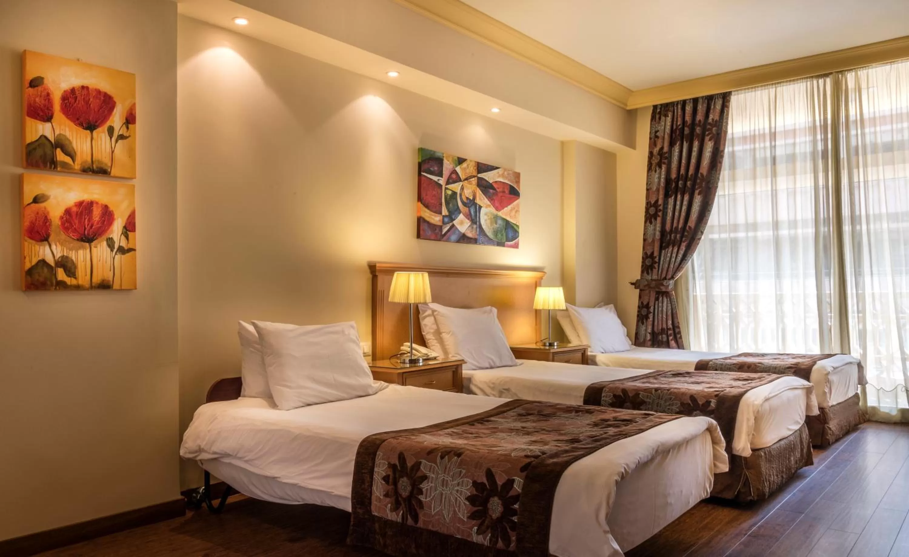 Bed in Bella Riva Hotel