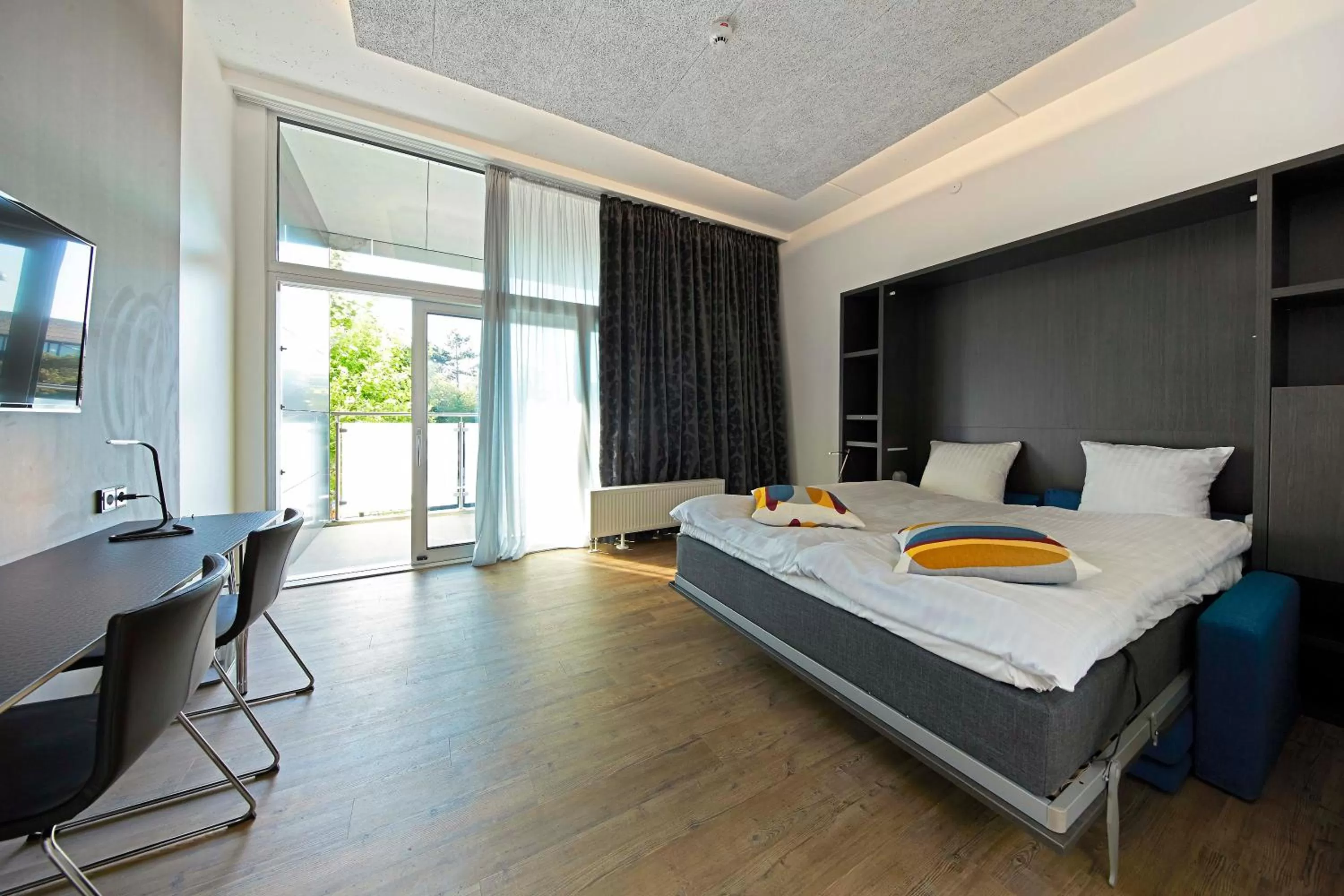 Bed in Living Suites