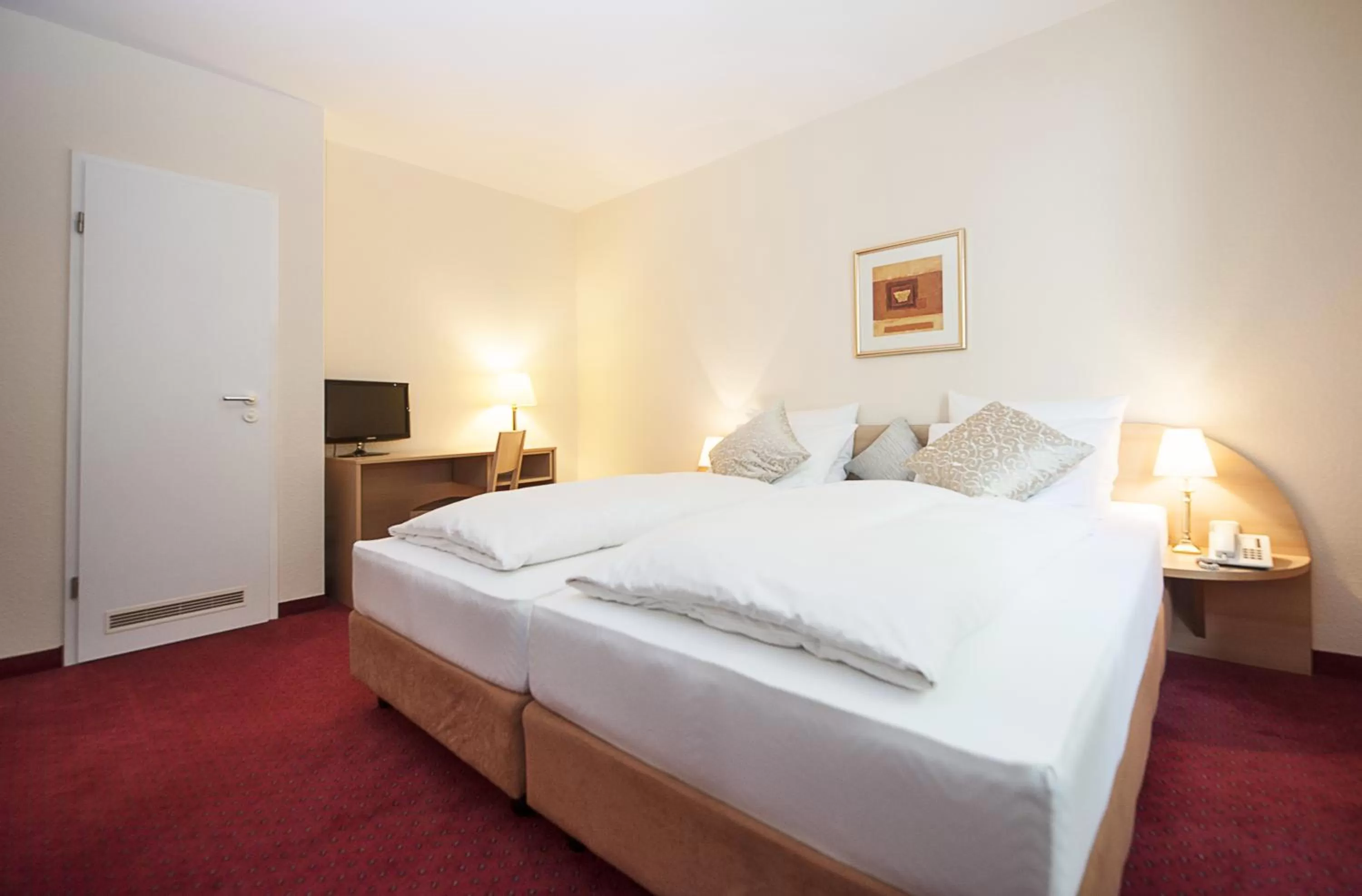 Photo of the whole room, Bed in Comfort Garni Stadtzentrum Hotel