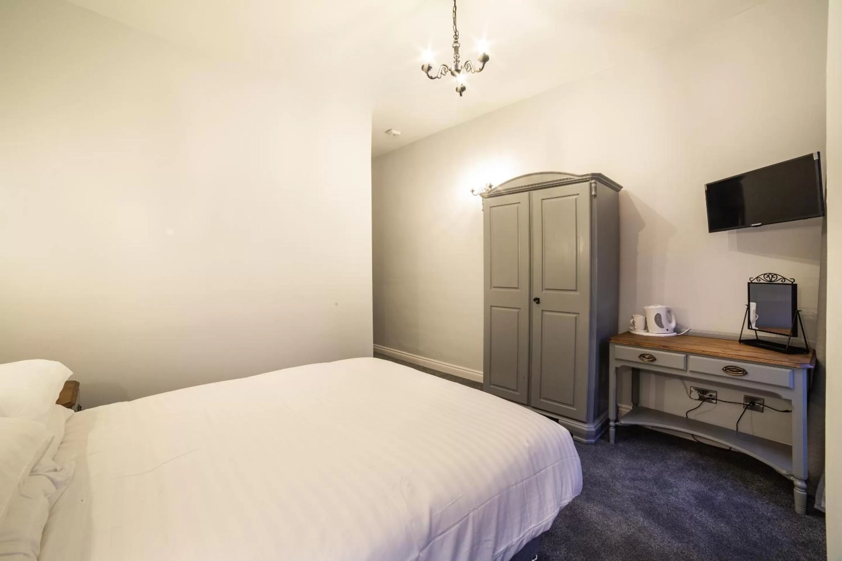 Bed in Churchill's Hotel