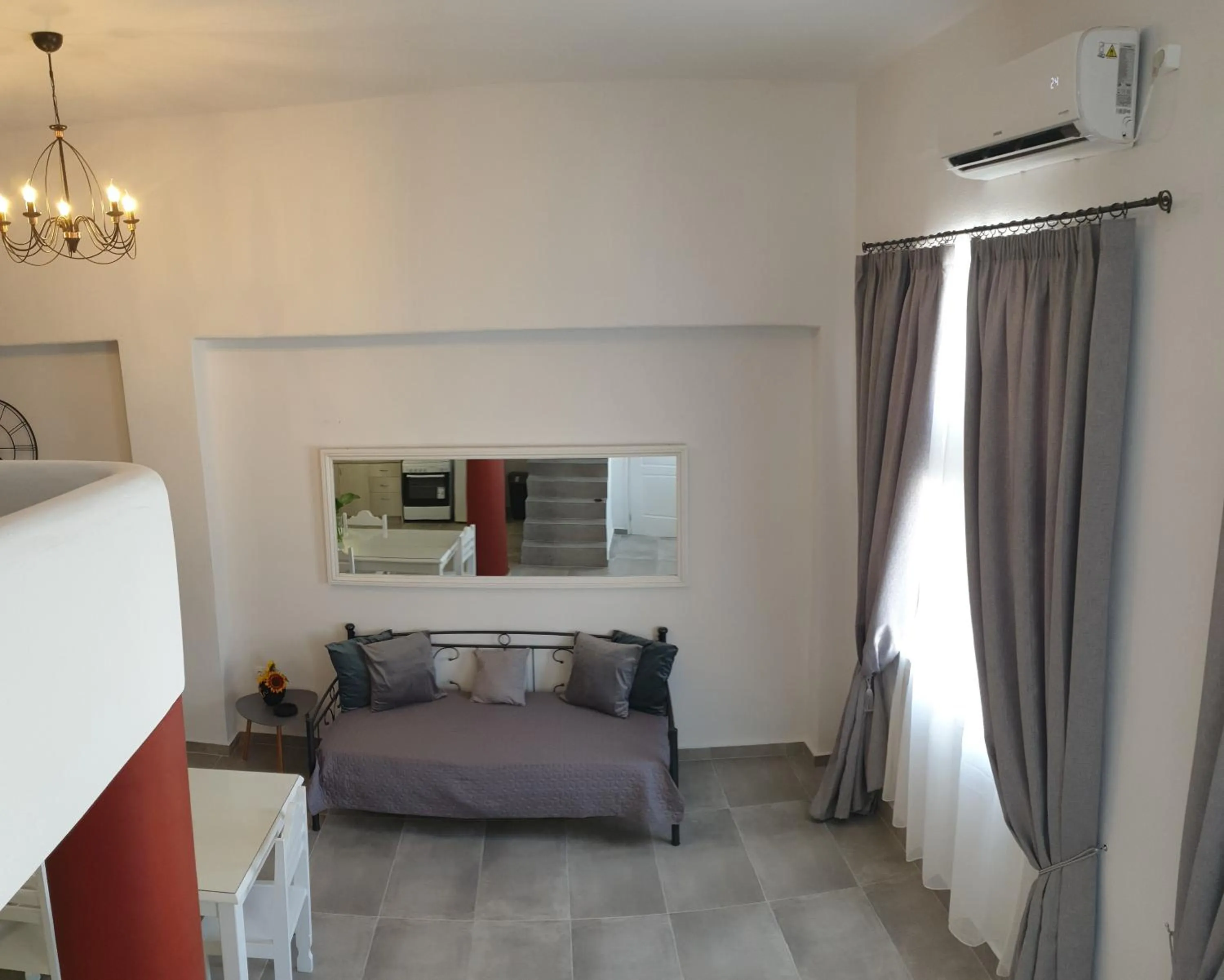 Seating area, Bed in Porto Castello