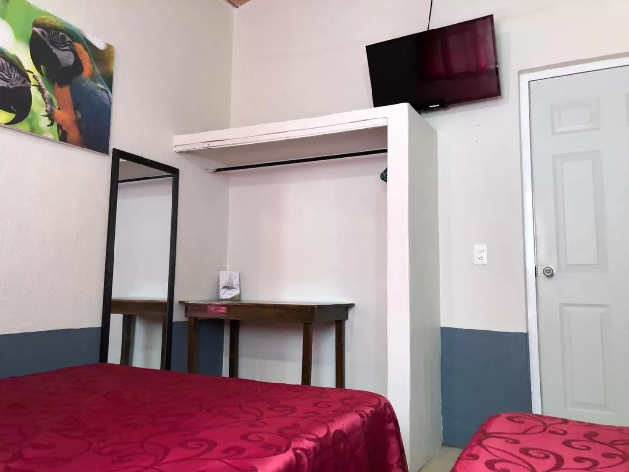 Bed, TV/Entertainment Center in Bungalows Las Glorias