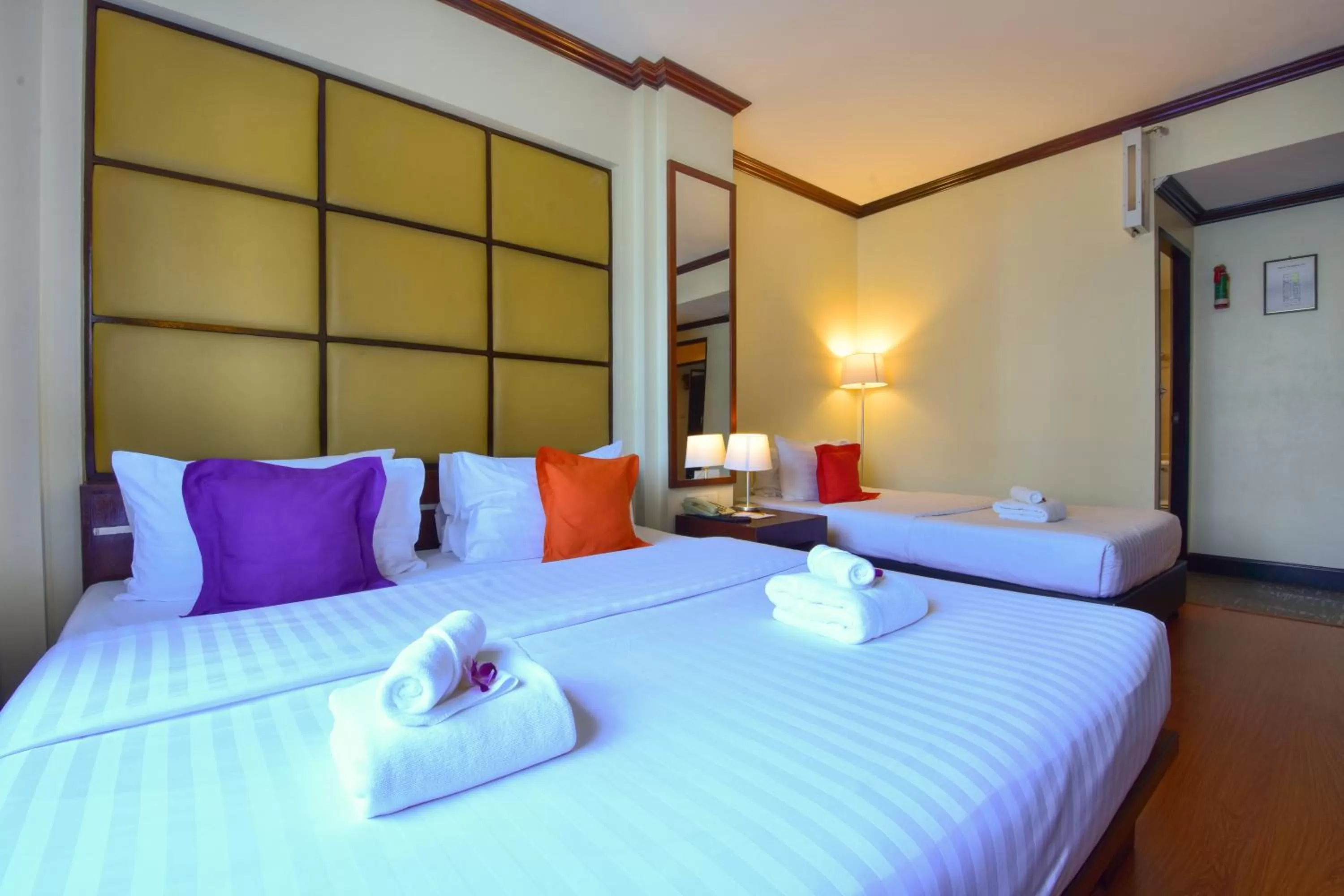 Bed in Grand Business Inn